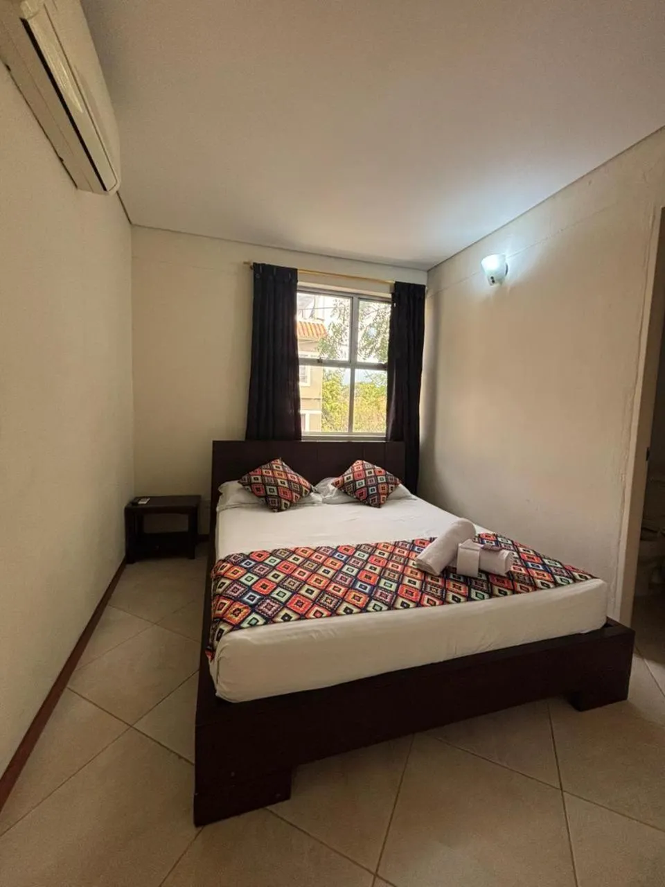 Bed in Hotel Tierra Santa Santa Fe de Antioquia