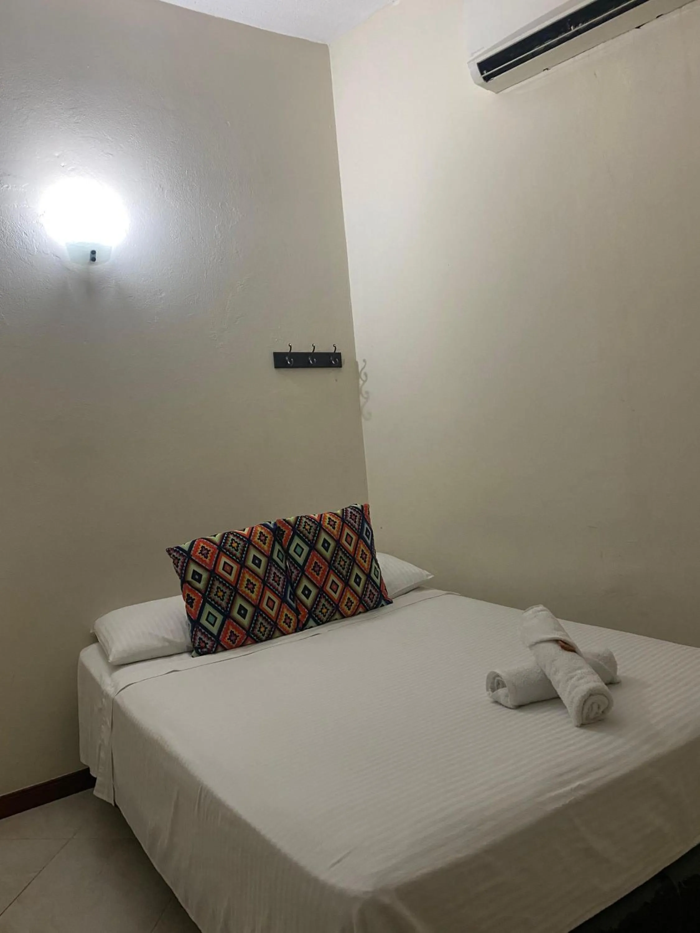 Bed in Hotel Tierra Santa Santa Fe de Antioquia
