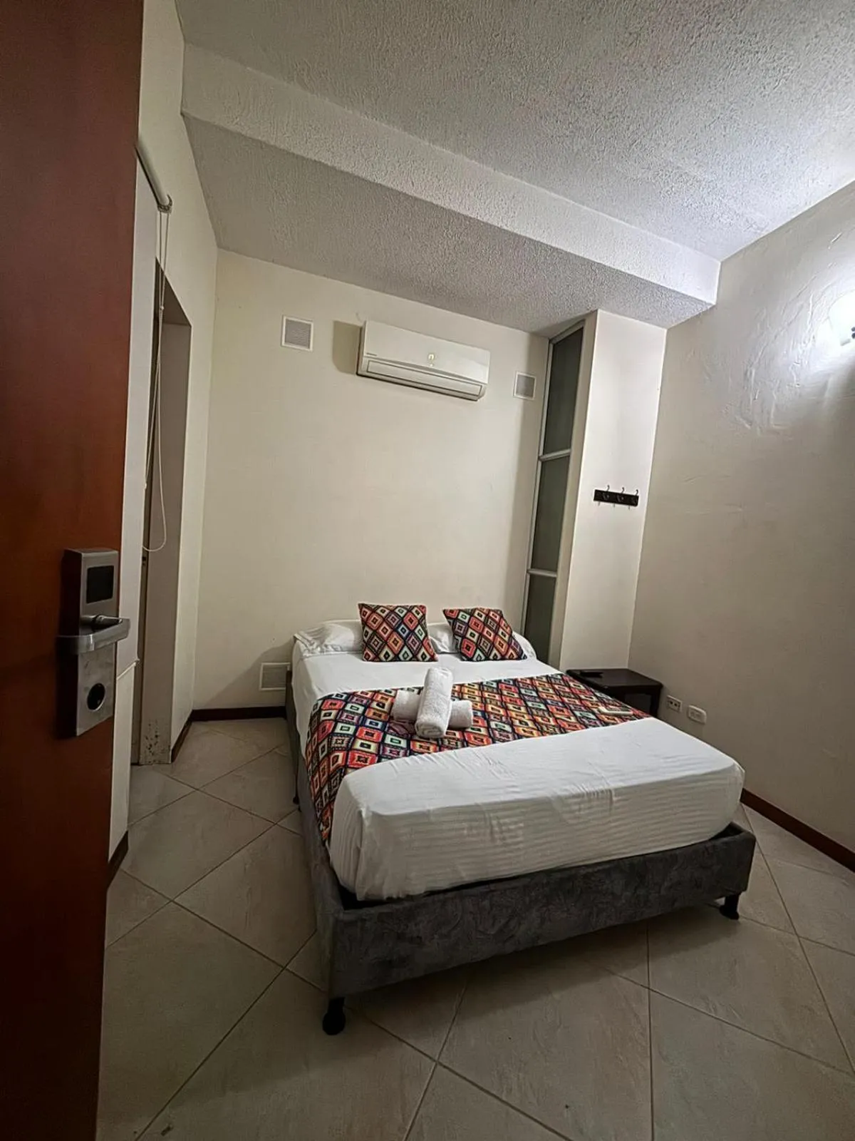 Bed in Hotel Tierra Santa Santa Fe de Antioquia