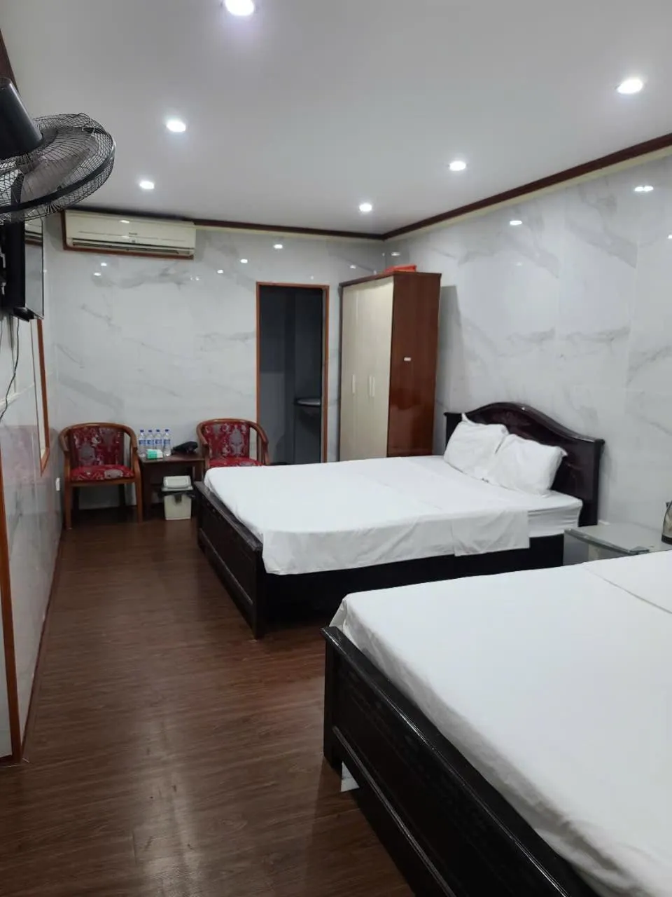 Bed in TUAN Central Hotel