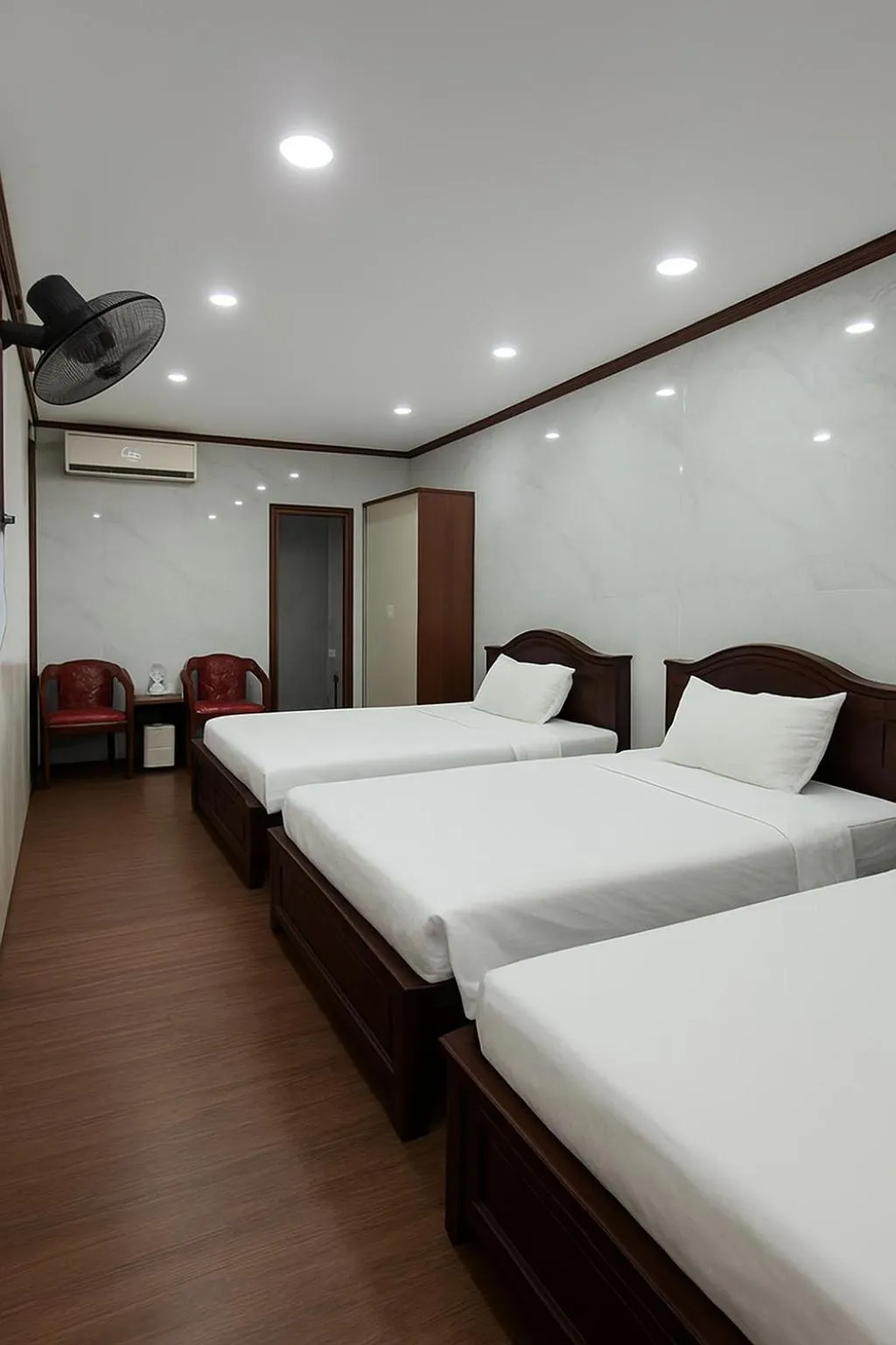 Bed in TUAN Central Hotel
