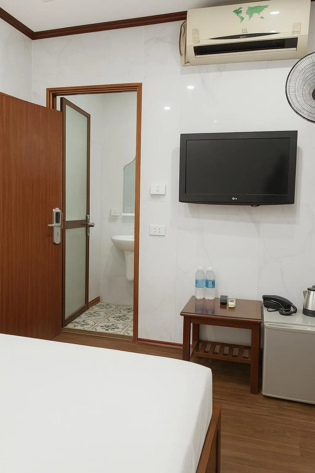 Bed in TUAN Central Hotel