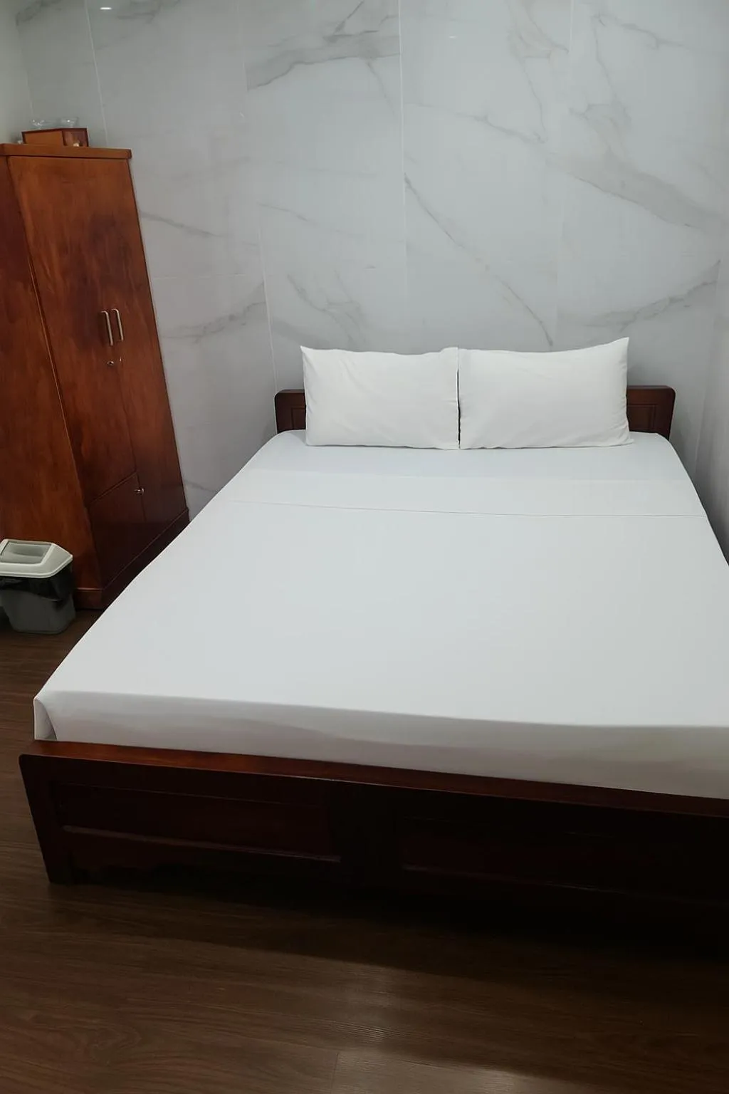 Bed in TUAN Central Hotel