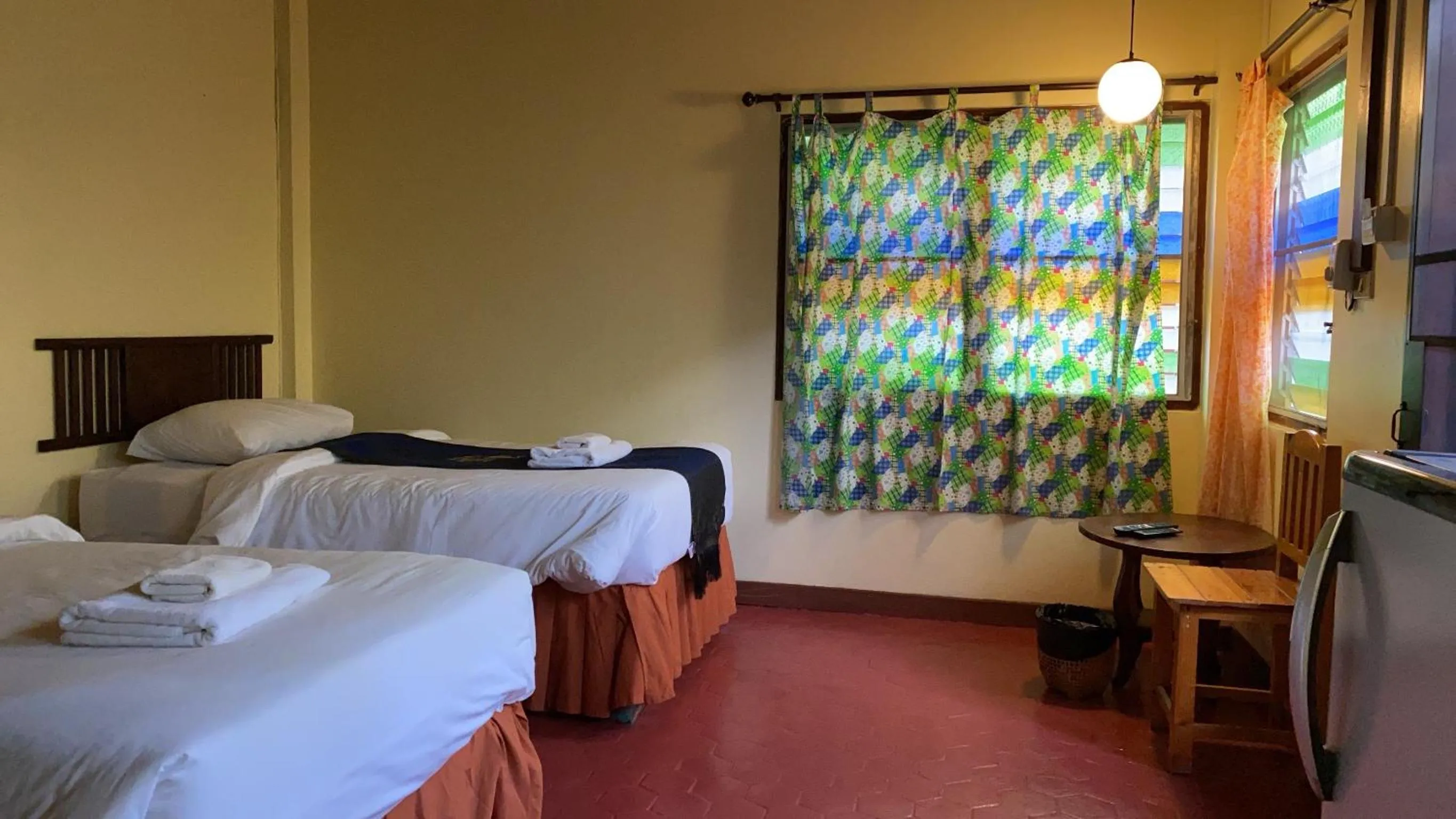 Bed in Golden Triangle Palace Hotel