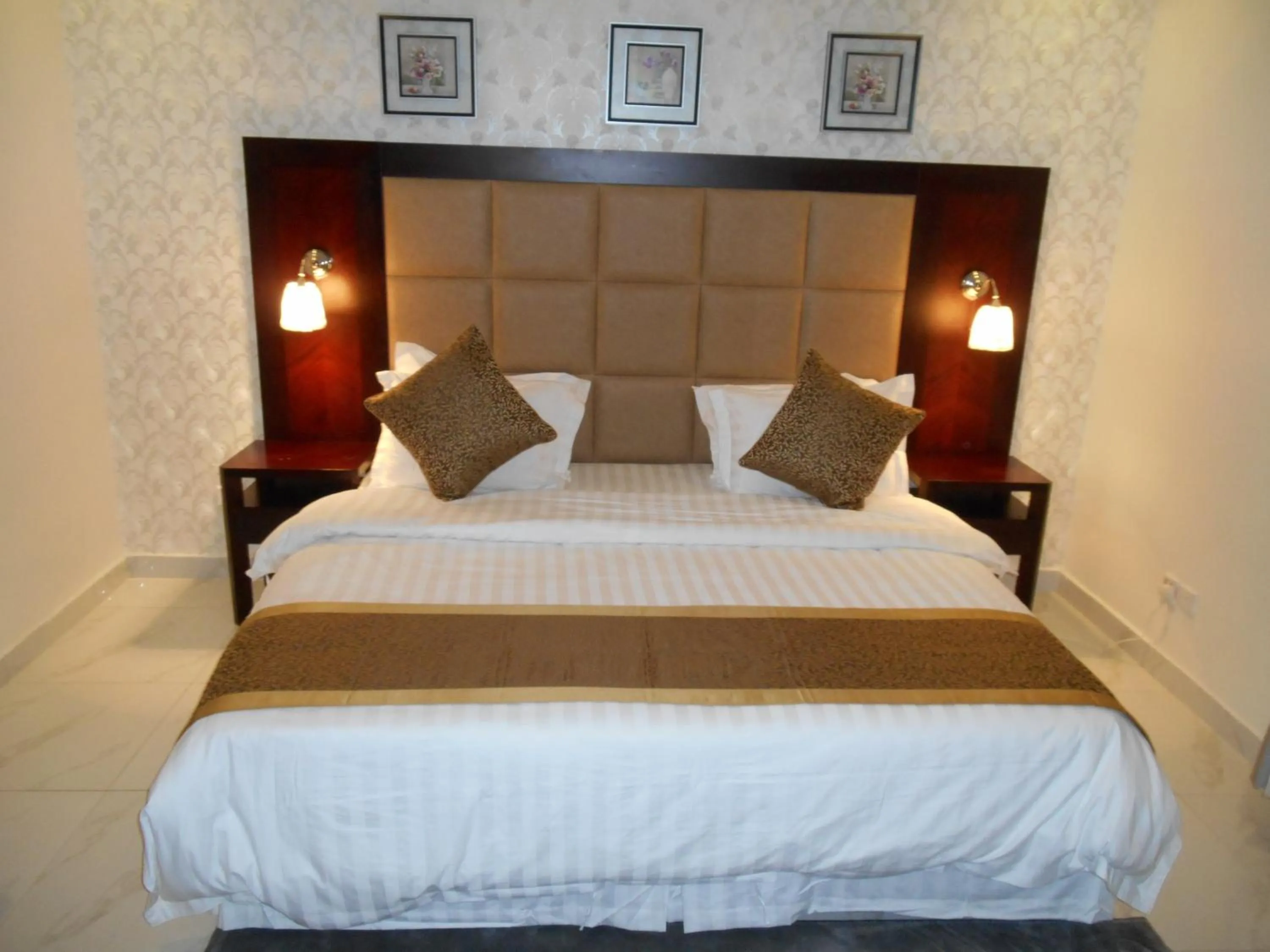 Bed in جلنار الشرق للشقق المخدومة