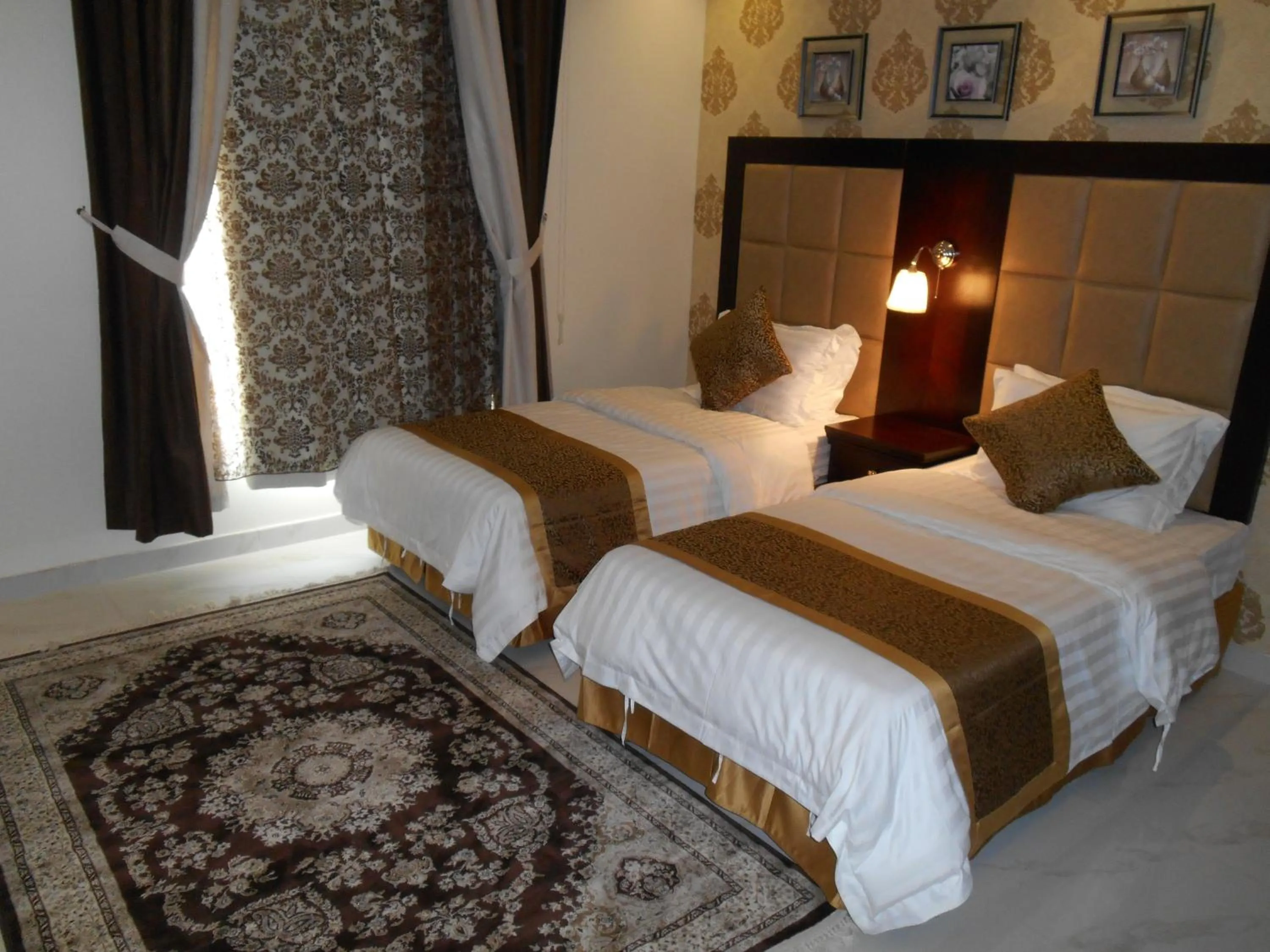 Bed in جلنار الشرق للشقق المخدومة