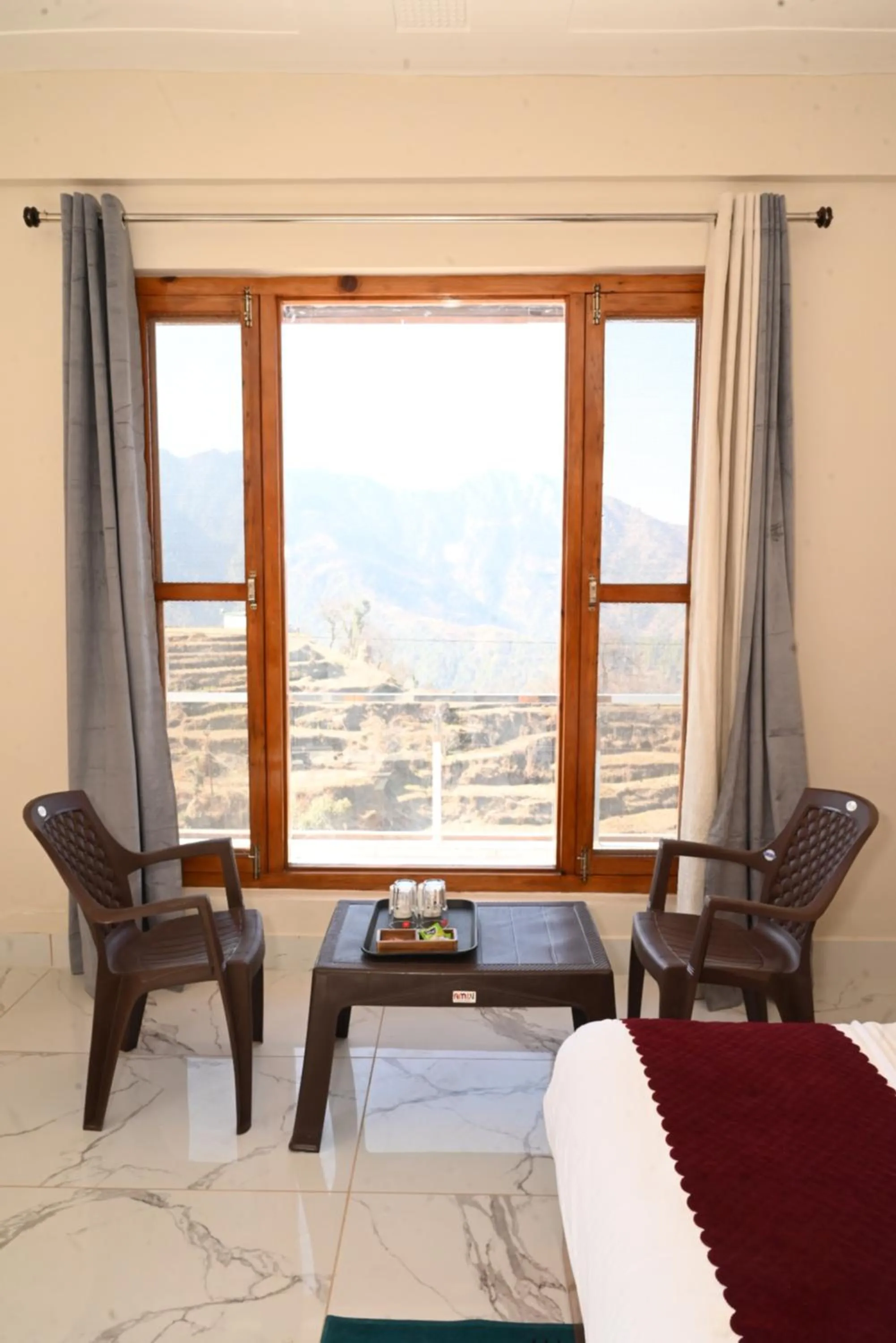 Seating area, Bed in Himalayan Hill Top Resort