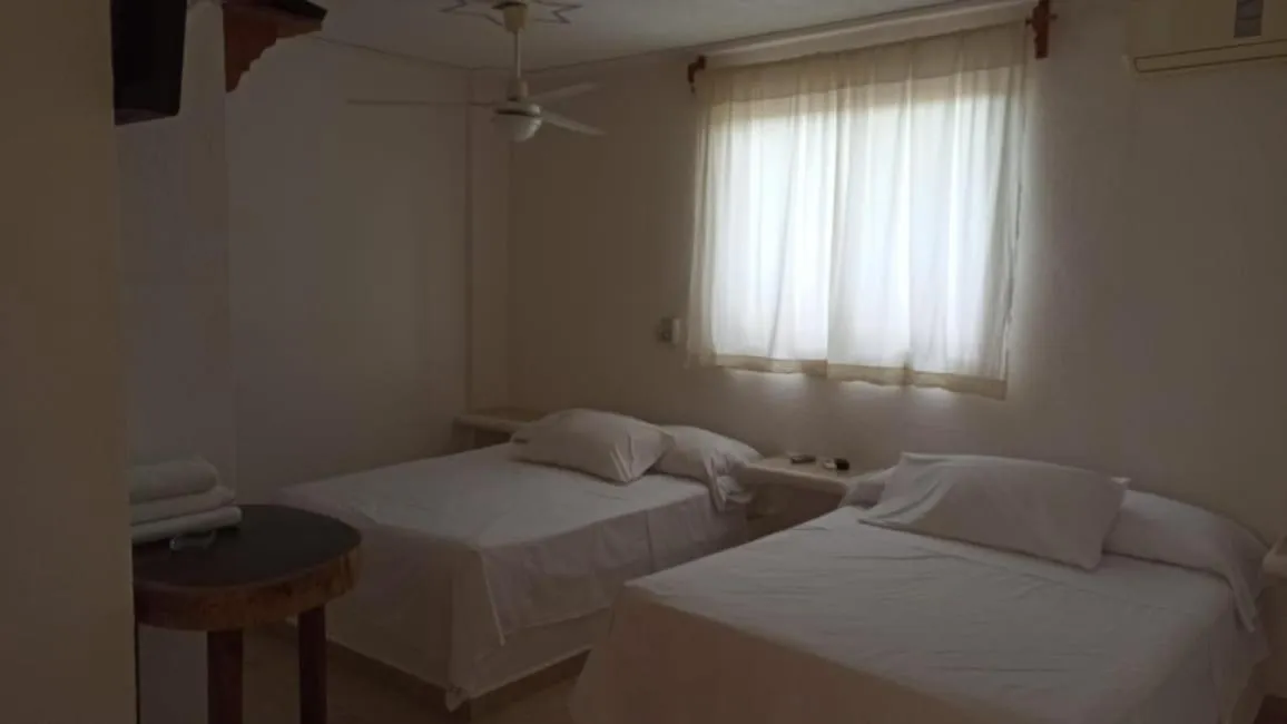 Bed in QUINTA DIAMANTE villas&hotel