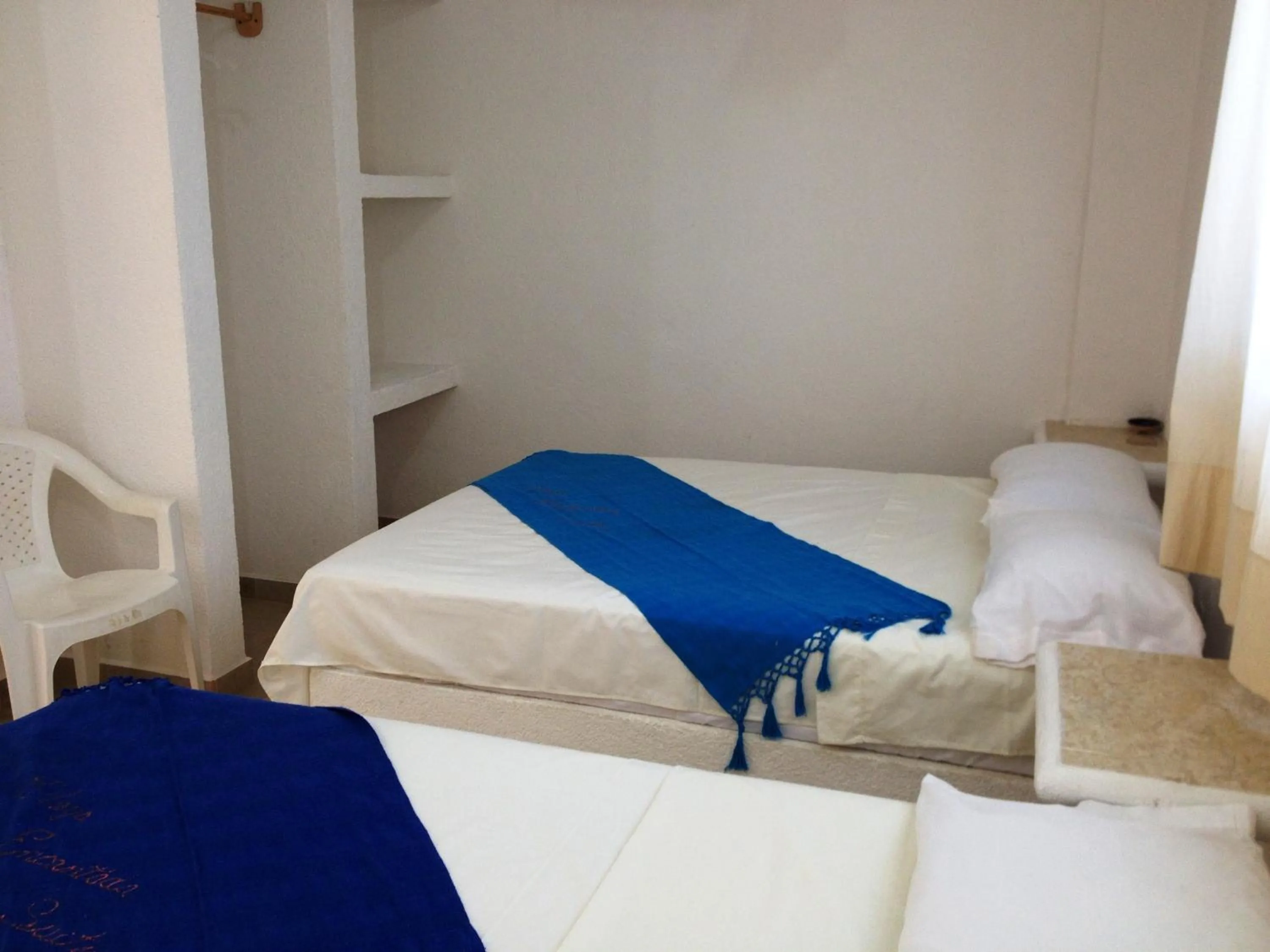 Bed in QUINTA DIAMANTE villas&hotel