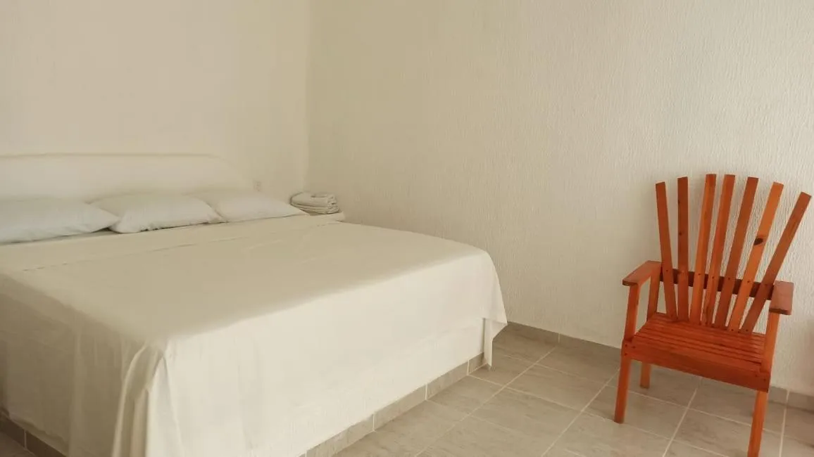 Bed in QUINTA DIAMANTE villas&hotel