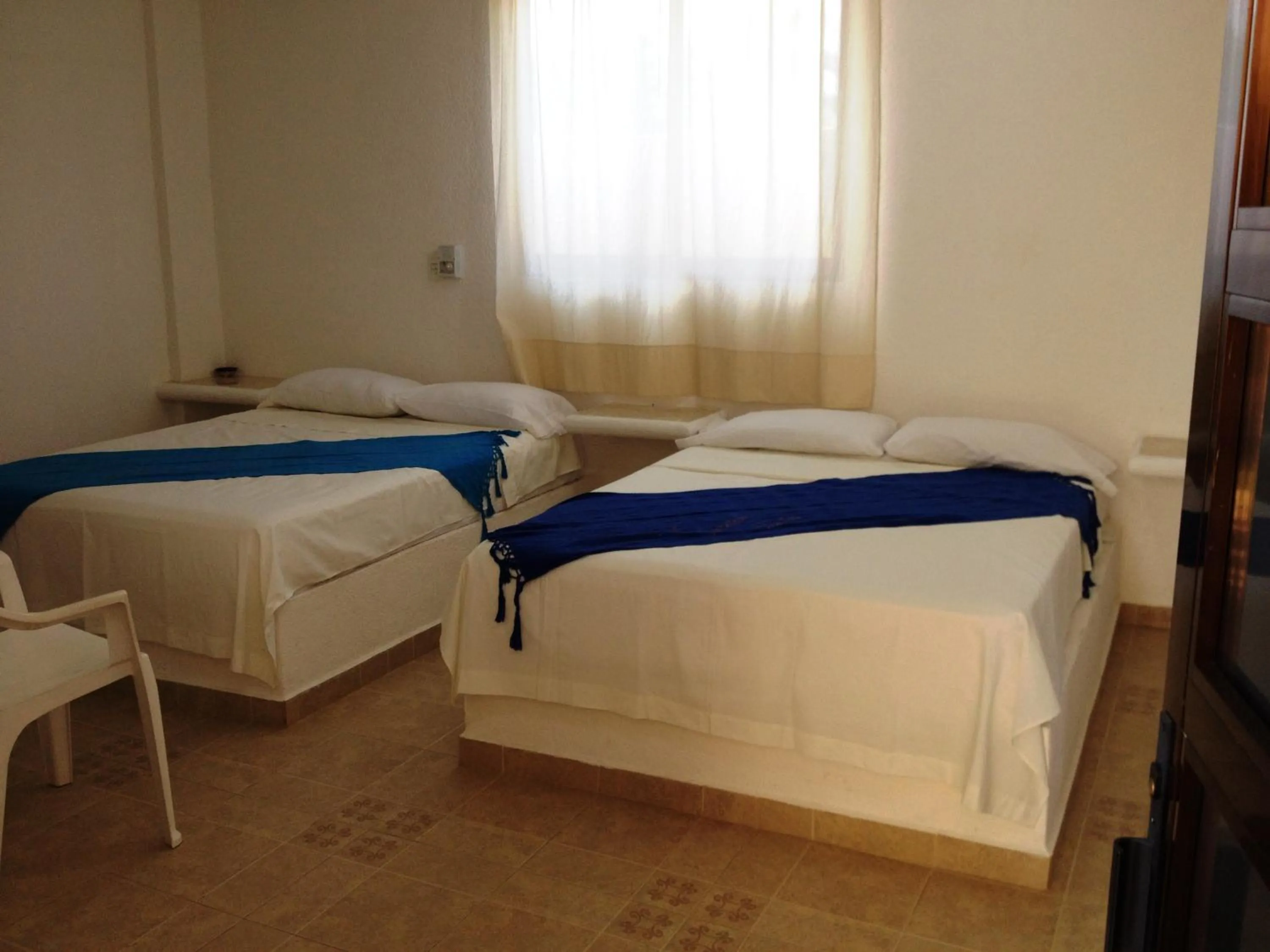 Bed in QUINTA DIAMANTE villas&hotel