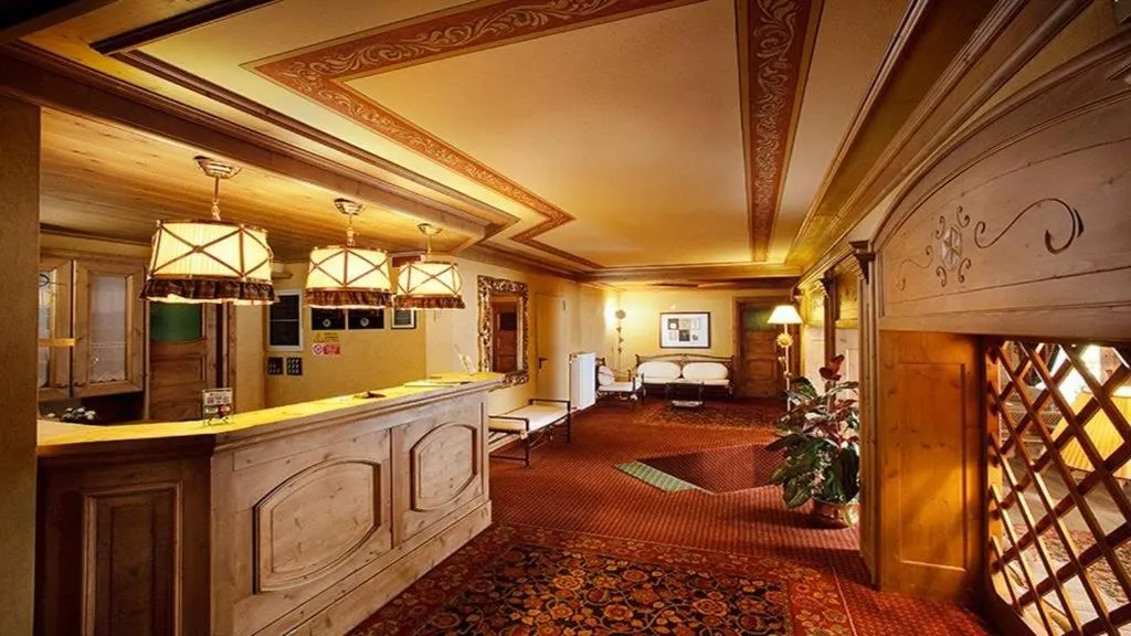 Seating area in Hotel Perla***