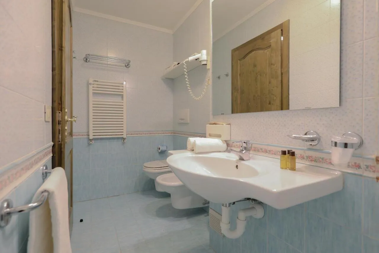 Bathroom in Hotel Perla***