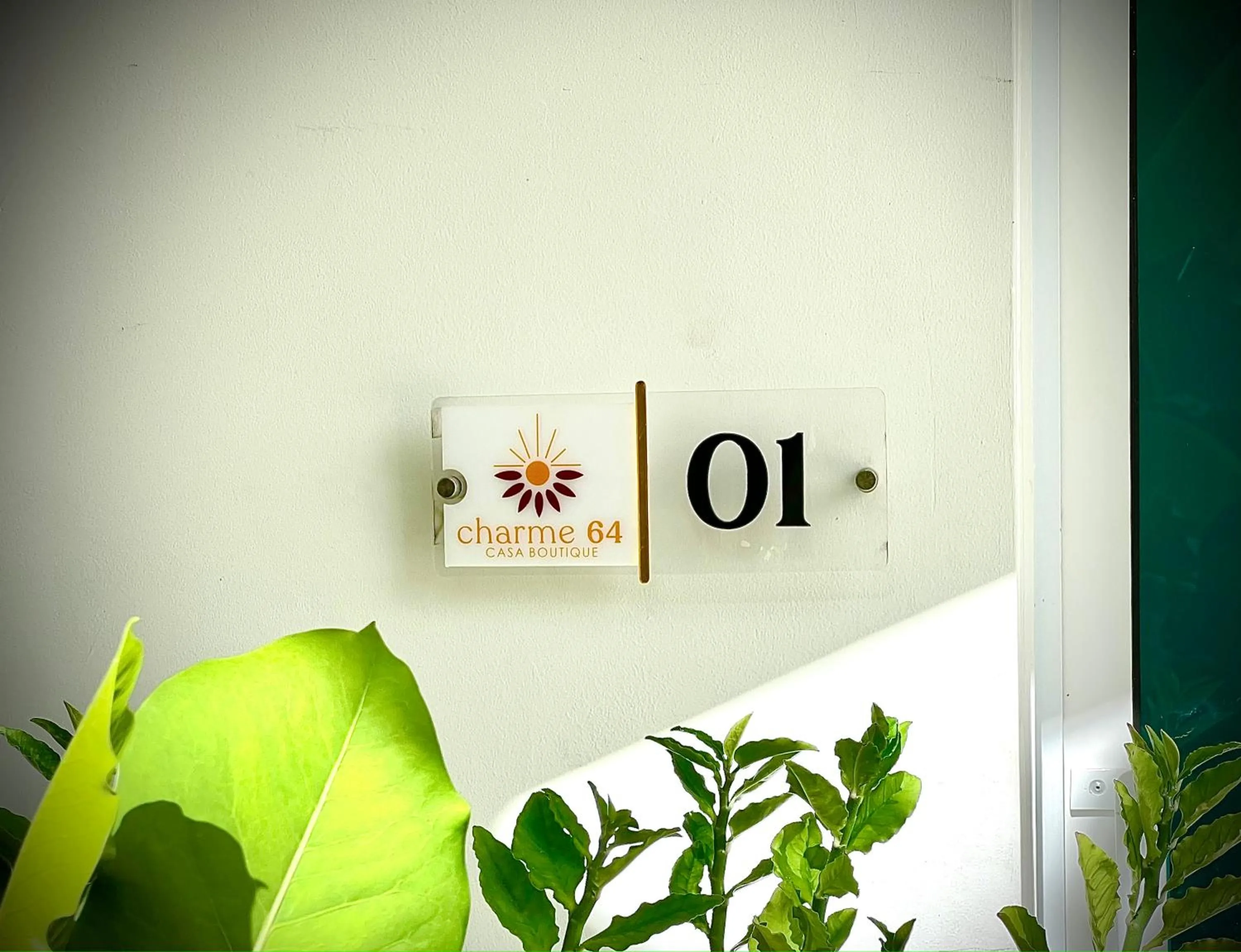 Property logo or sign in Charme 64 Hotel Boutique