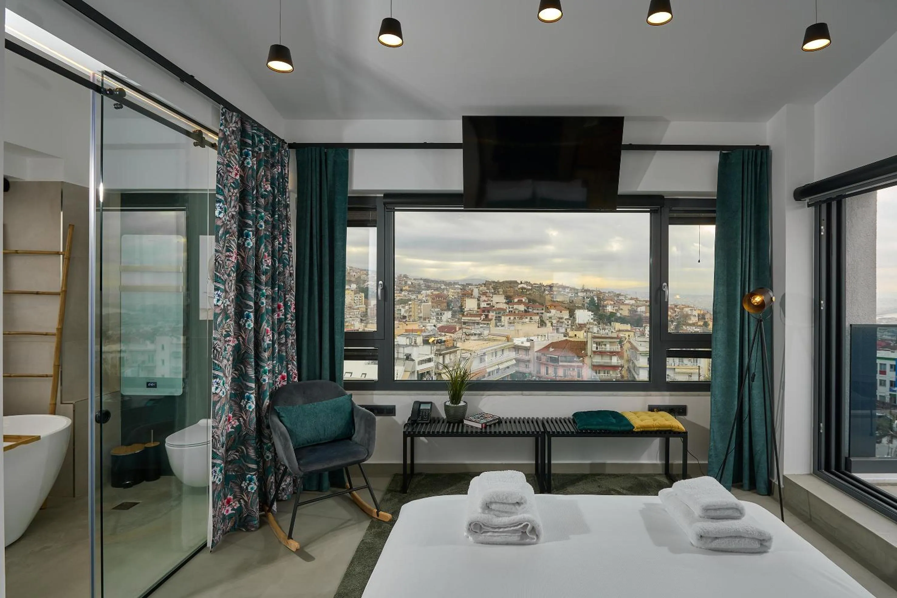 Bed in SIGMA Suites Hotel