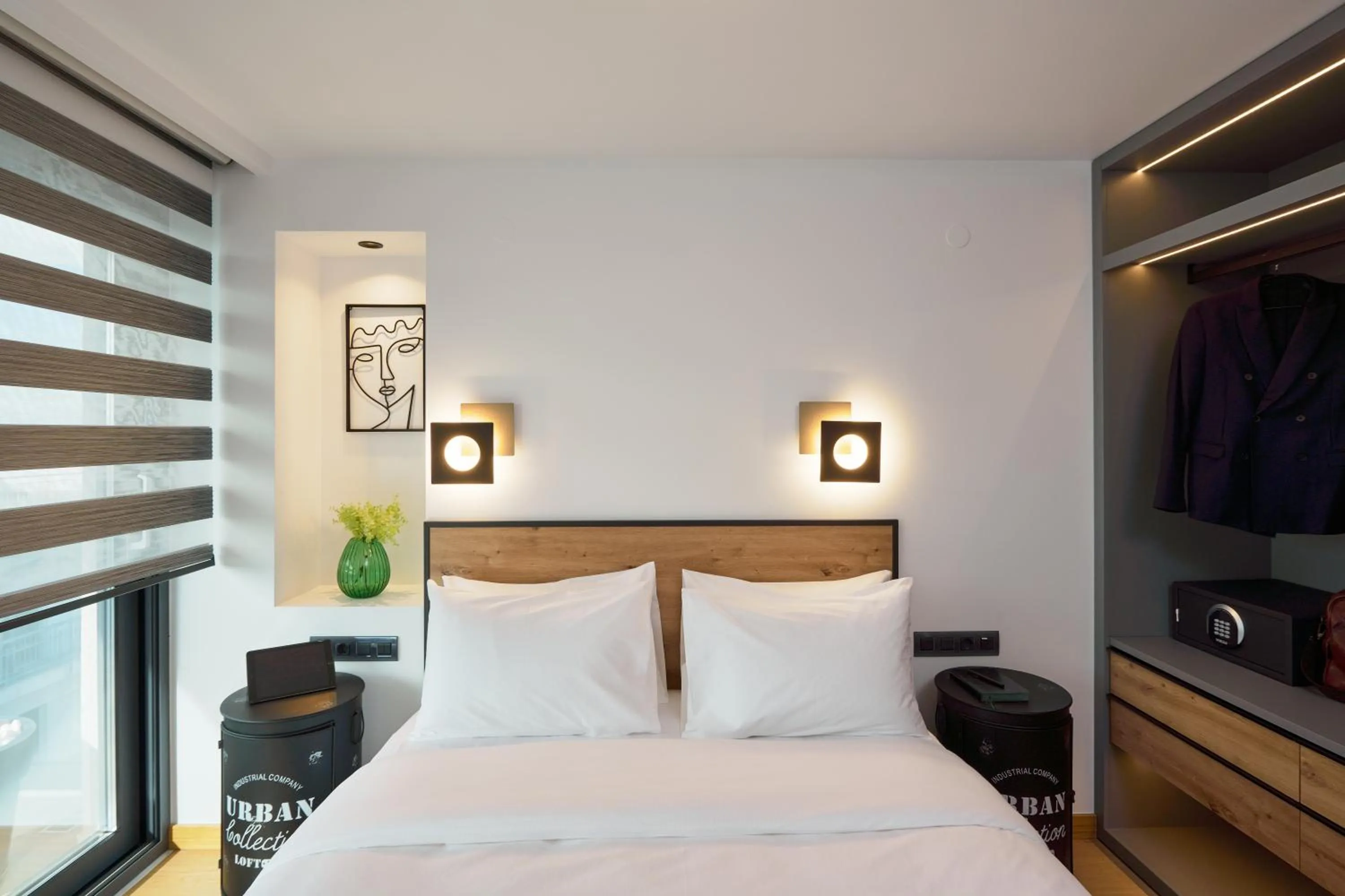 Bed in SIGMA Suites Hotel