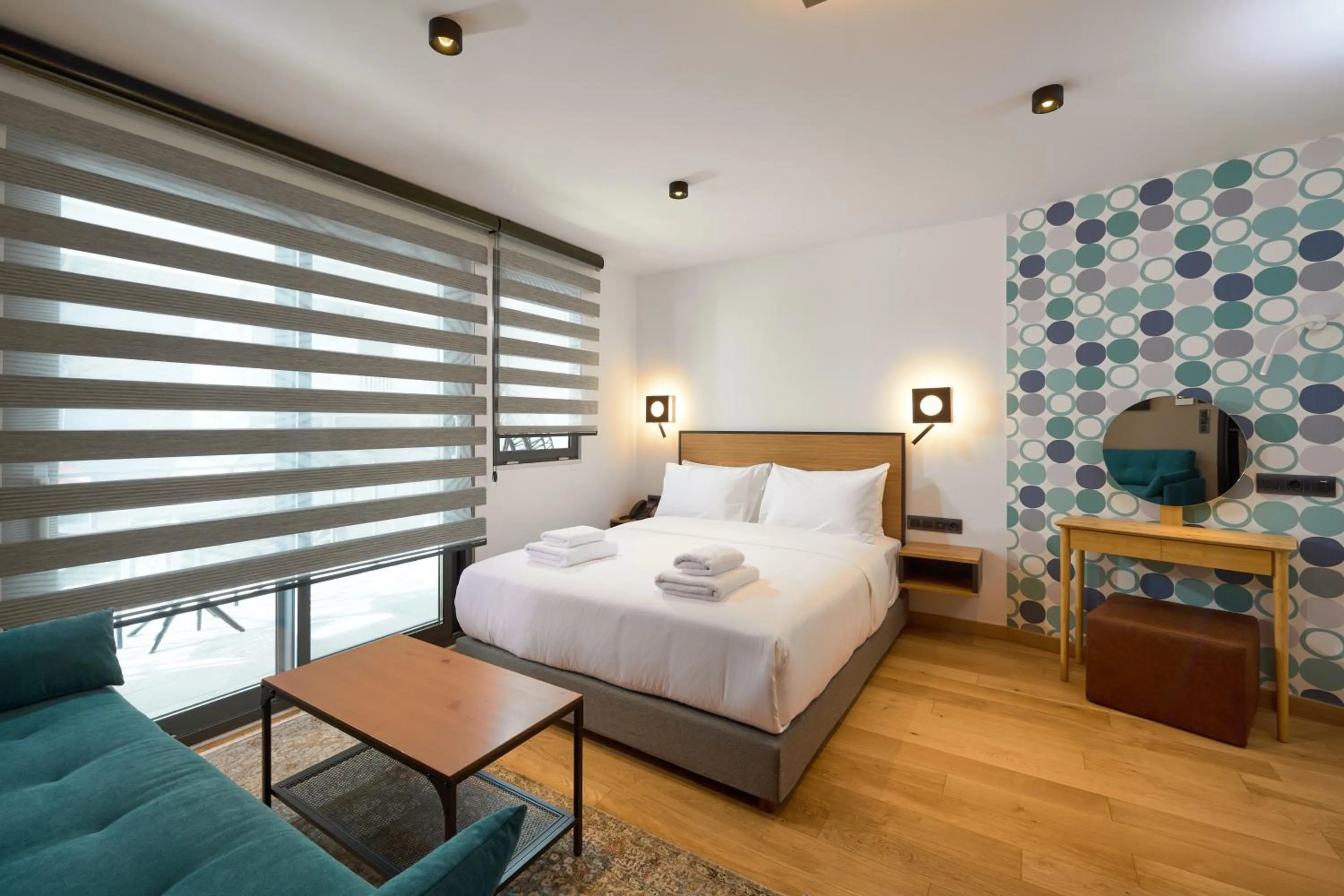 Bed in SIGMA Suites Hotel