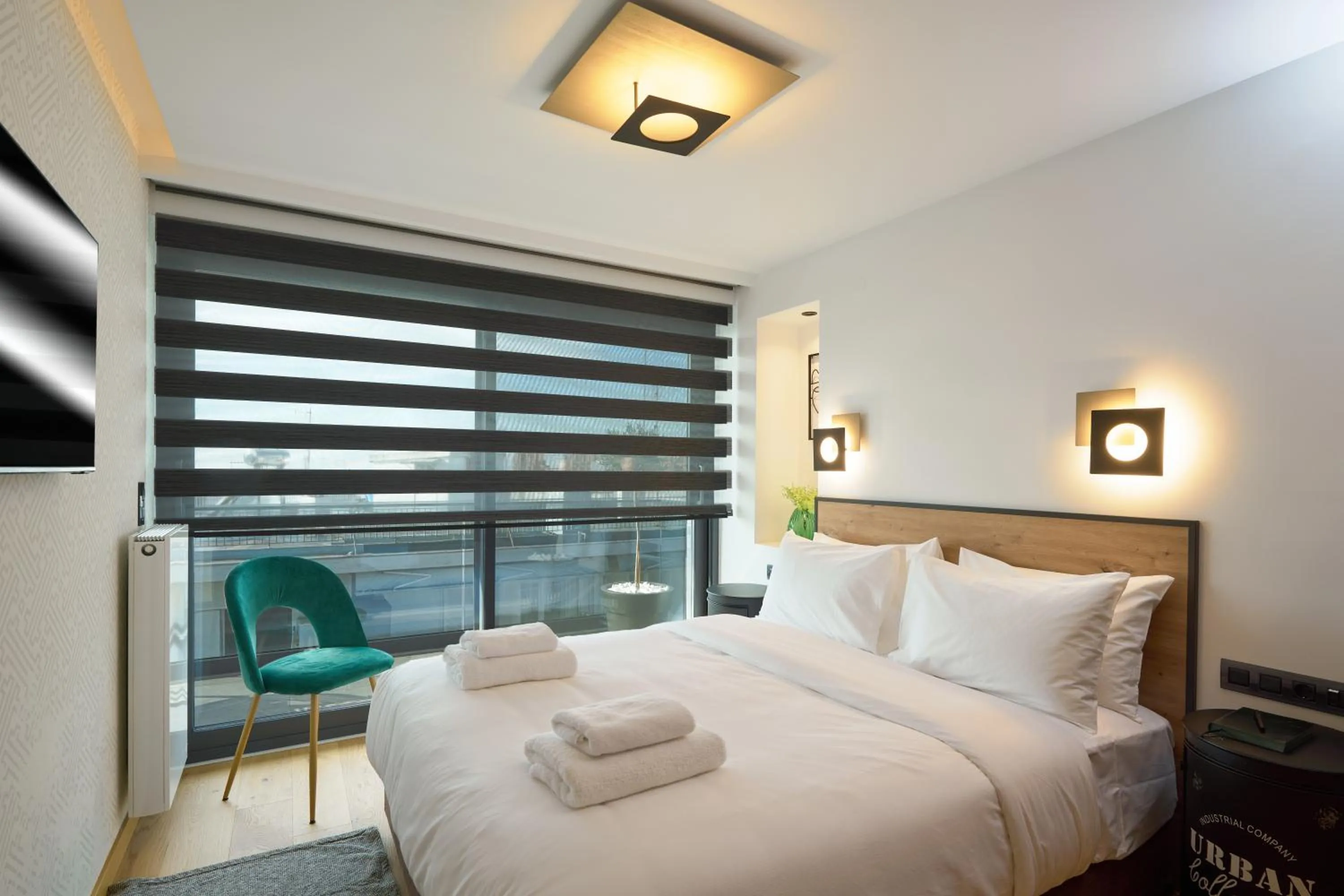 Bed in SIGMA Suites Hotel