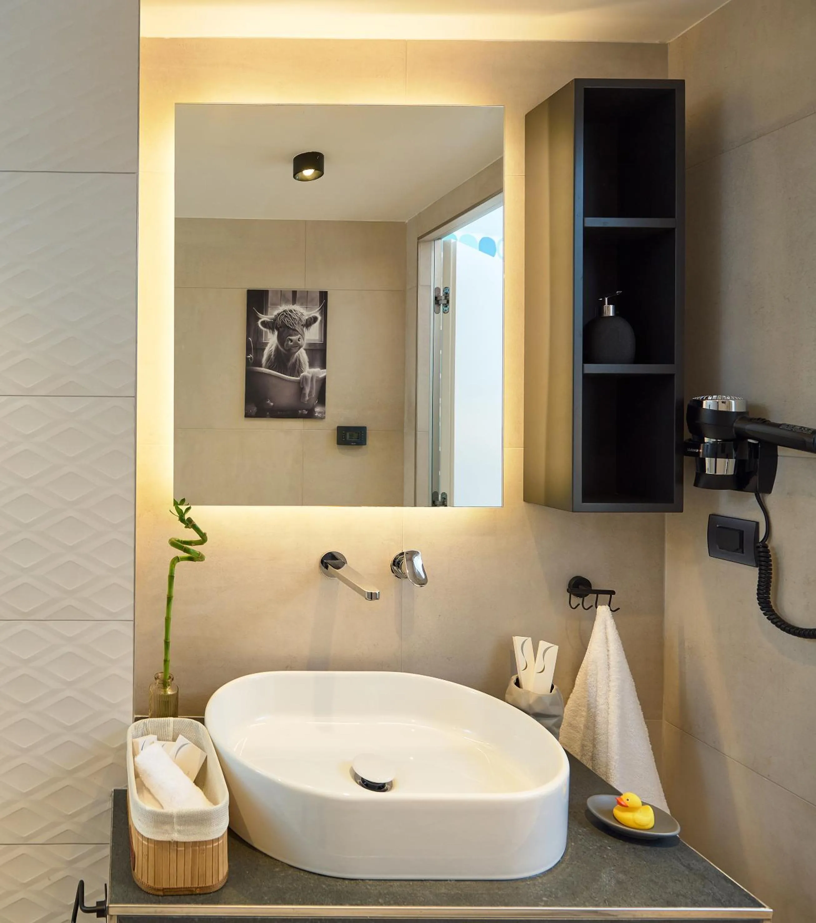 Bathroom in SIGMA Suites Hotel