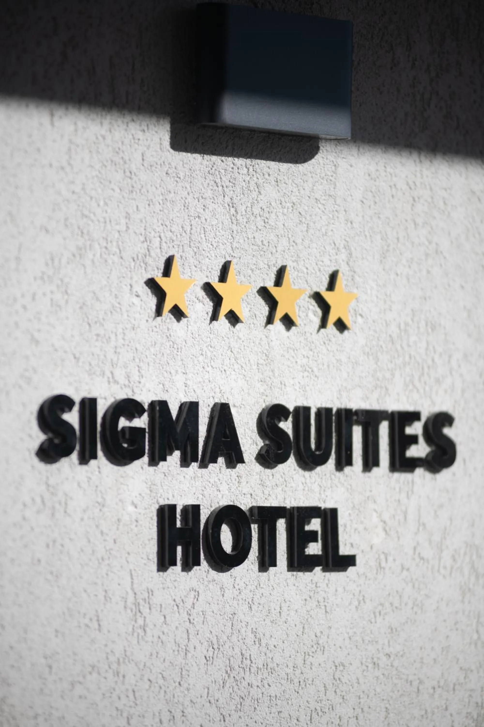 Property logo or sign in SIGMA Suites Hotel