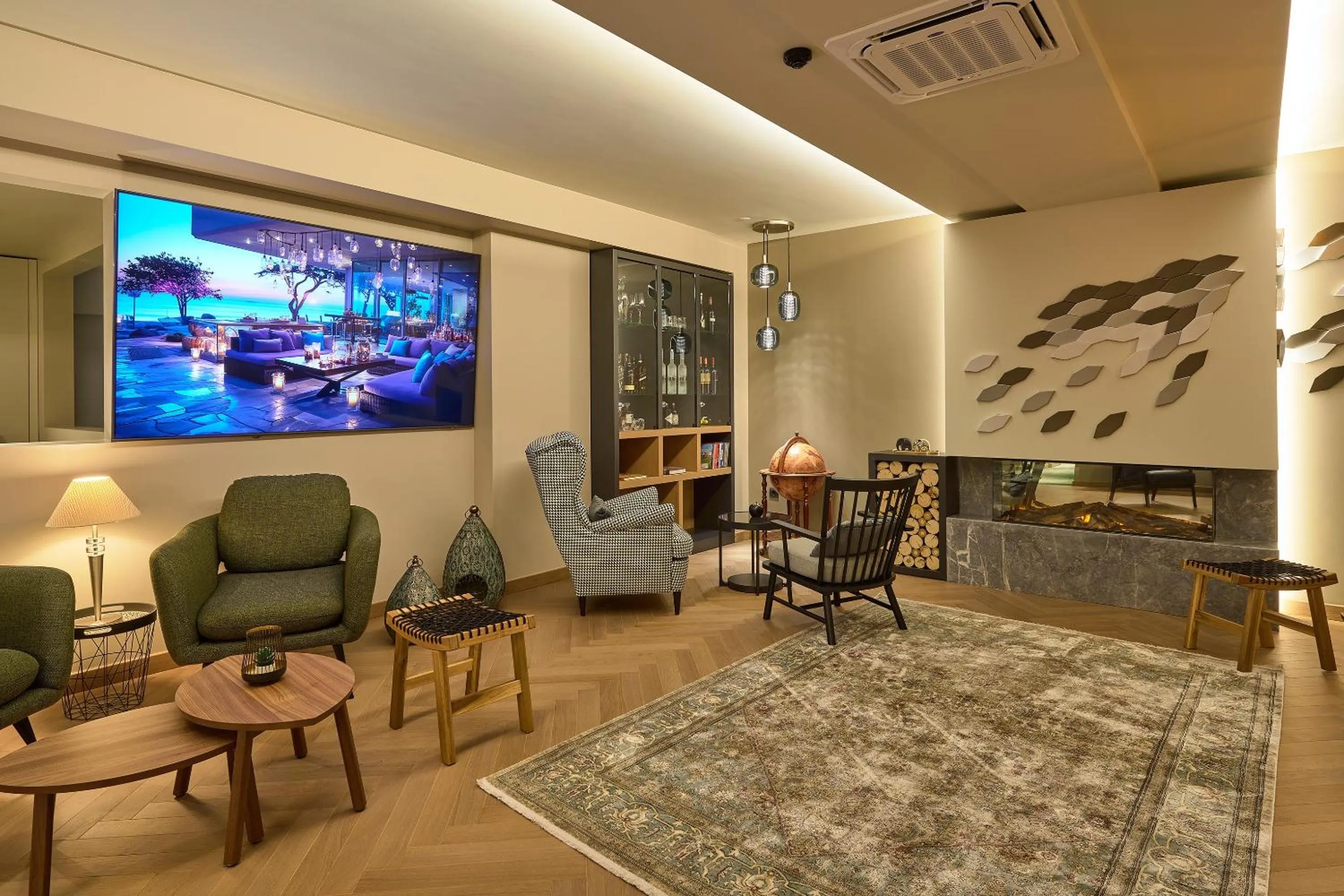 Communal lounge/ TV room in SIGMA Suites Hotel