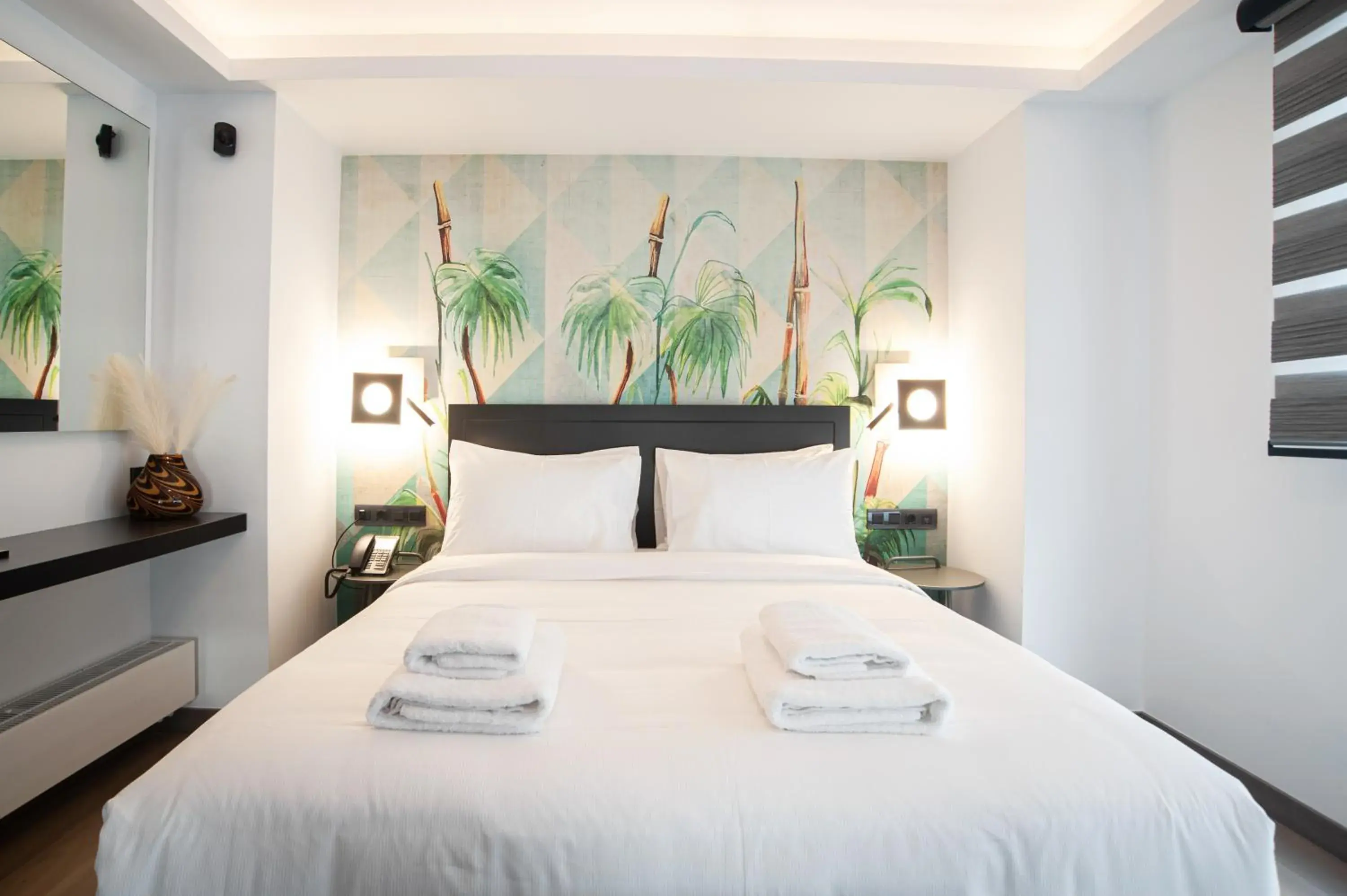 Bed in SIGMA Suites Hotel Bed in SIGMA Suites Hotel