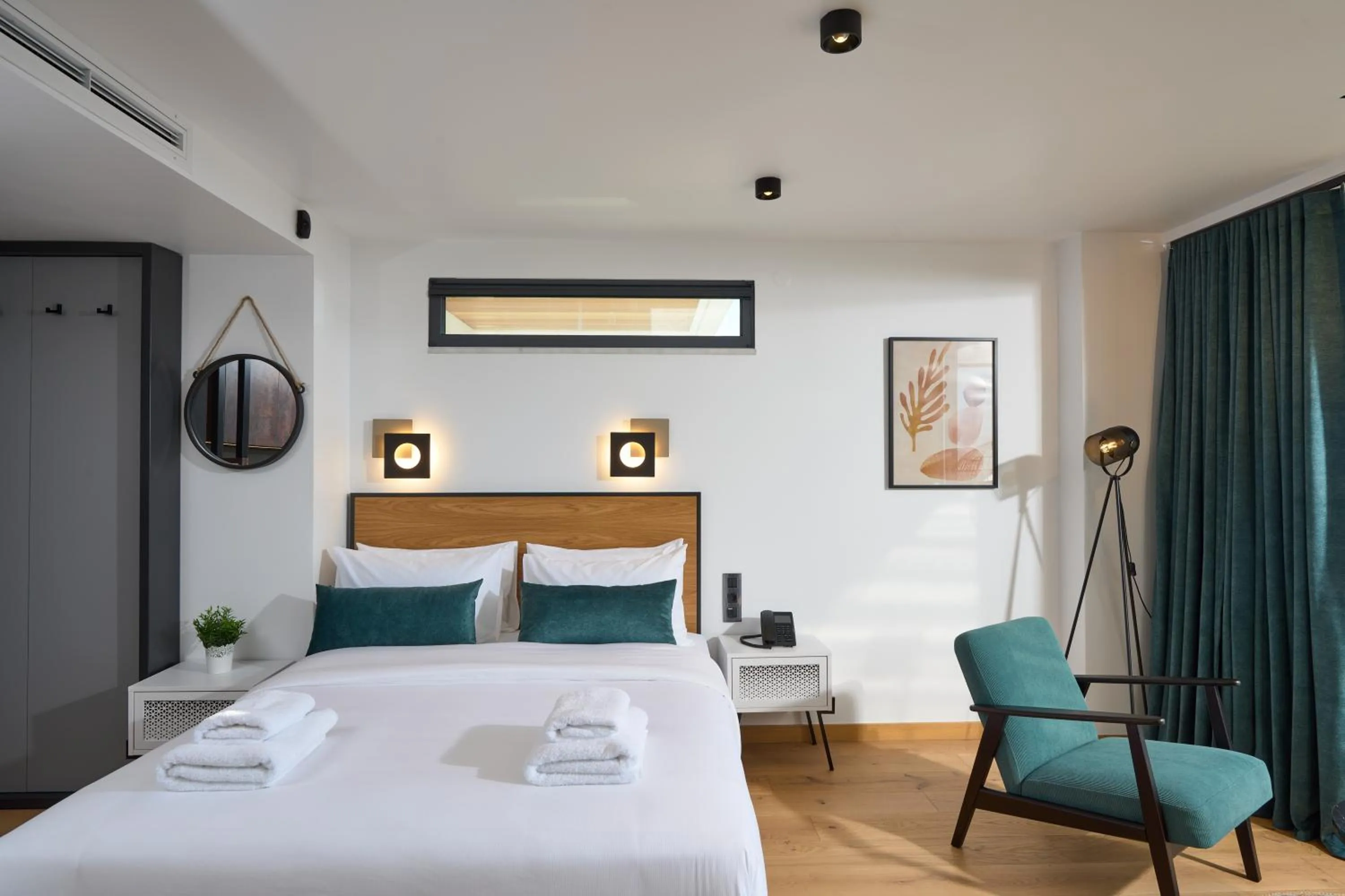 Bed in SIGMA Suites Hotel