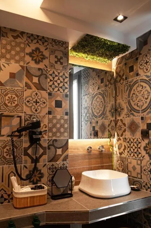 Bathroom in SIGMA Suites Hotel