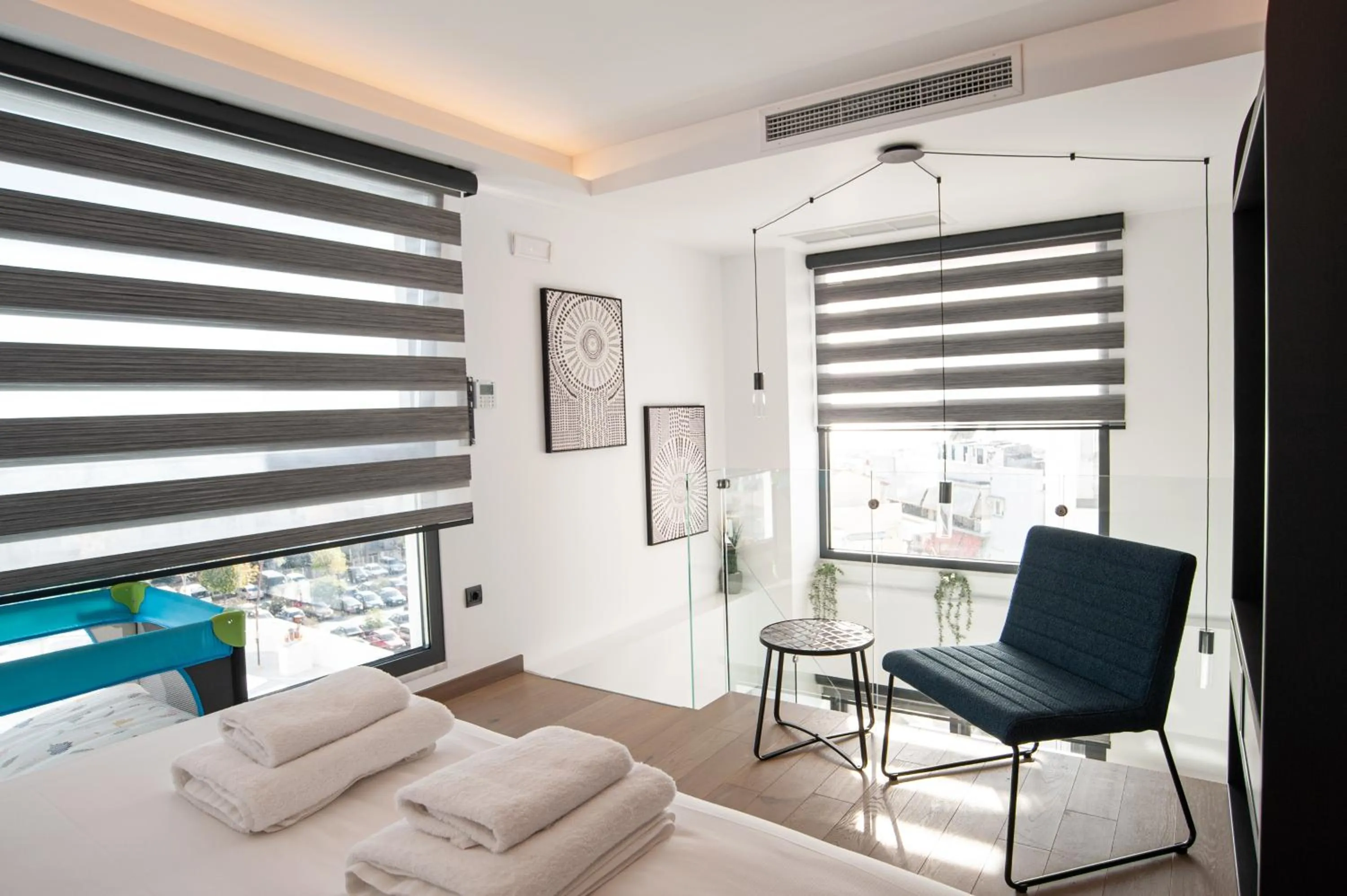 Bed in SIGMA Suites Hotel