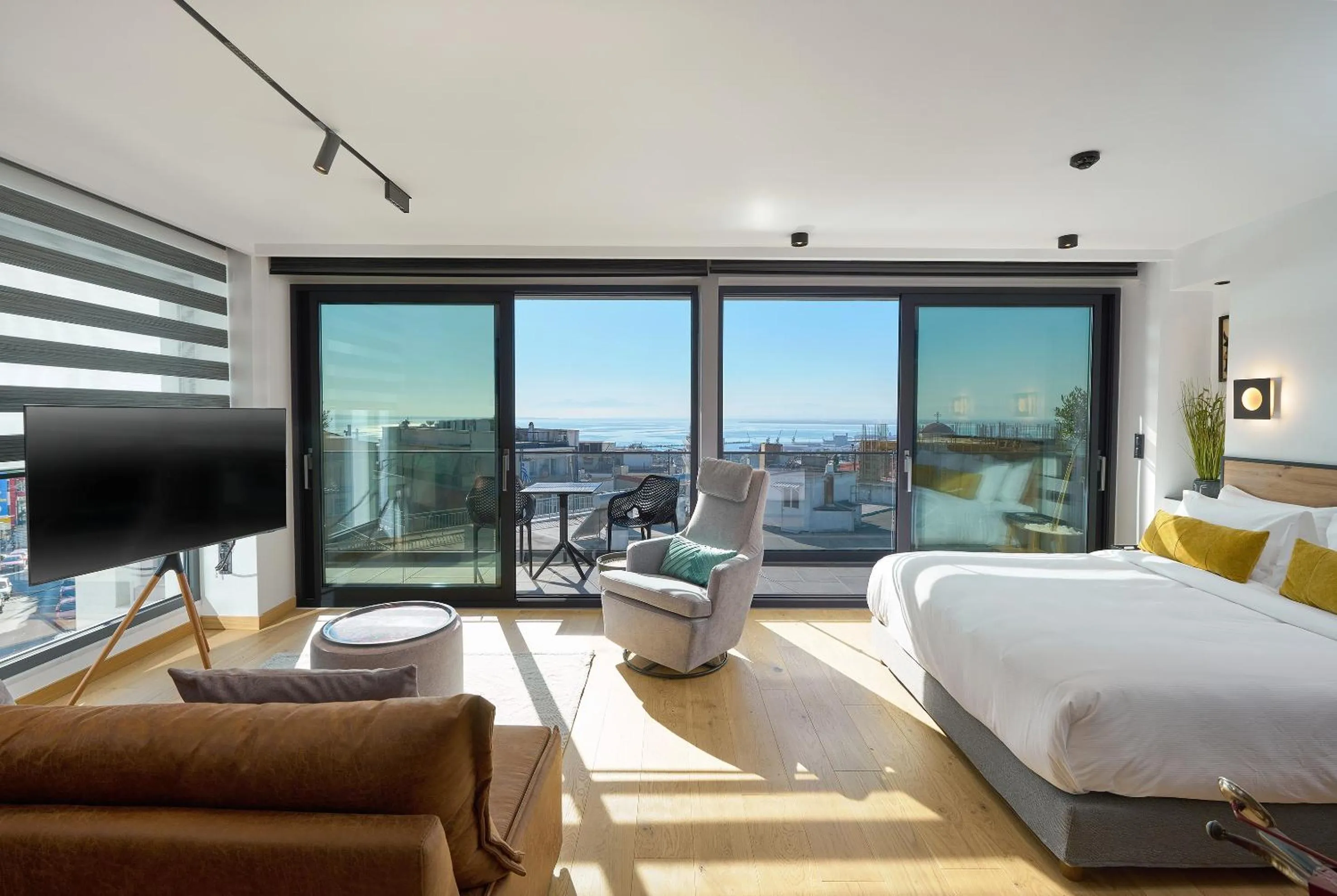 Bed in SIGMA Suites Hotel