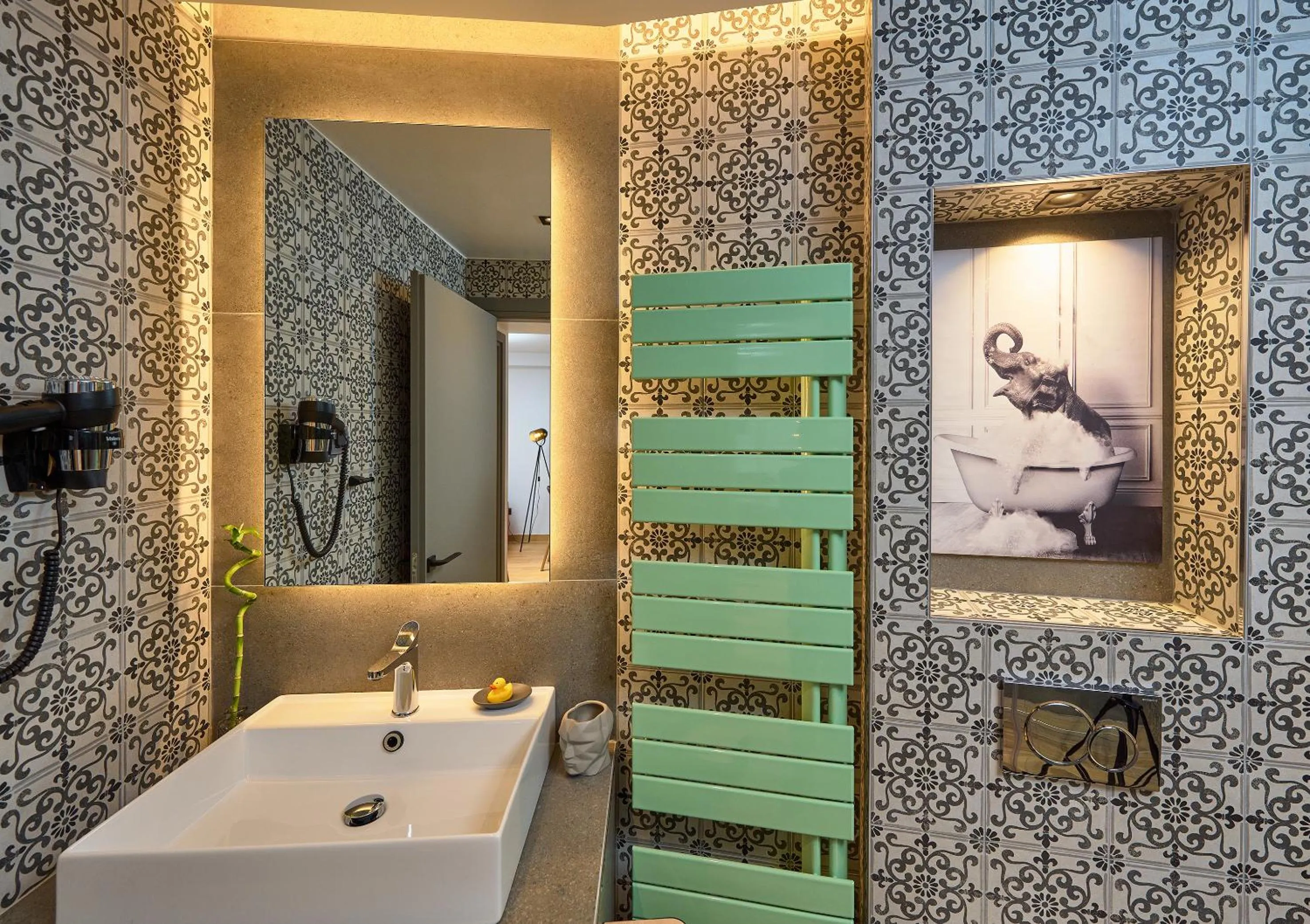 Bathroom in SIGMA Suites Hotel