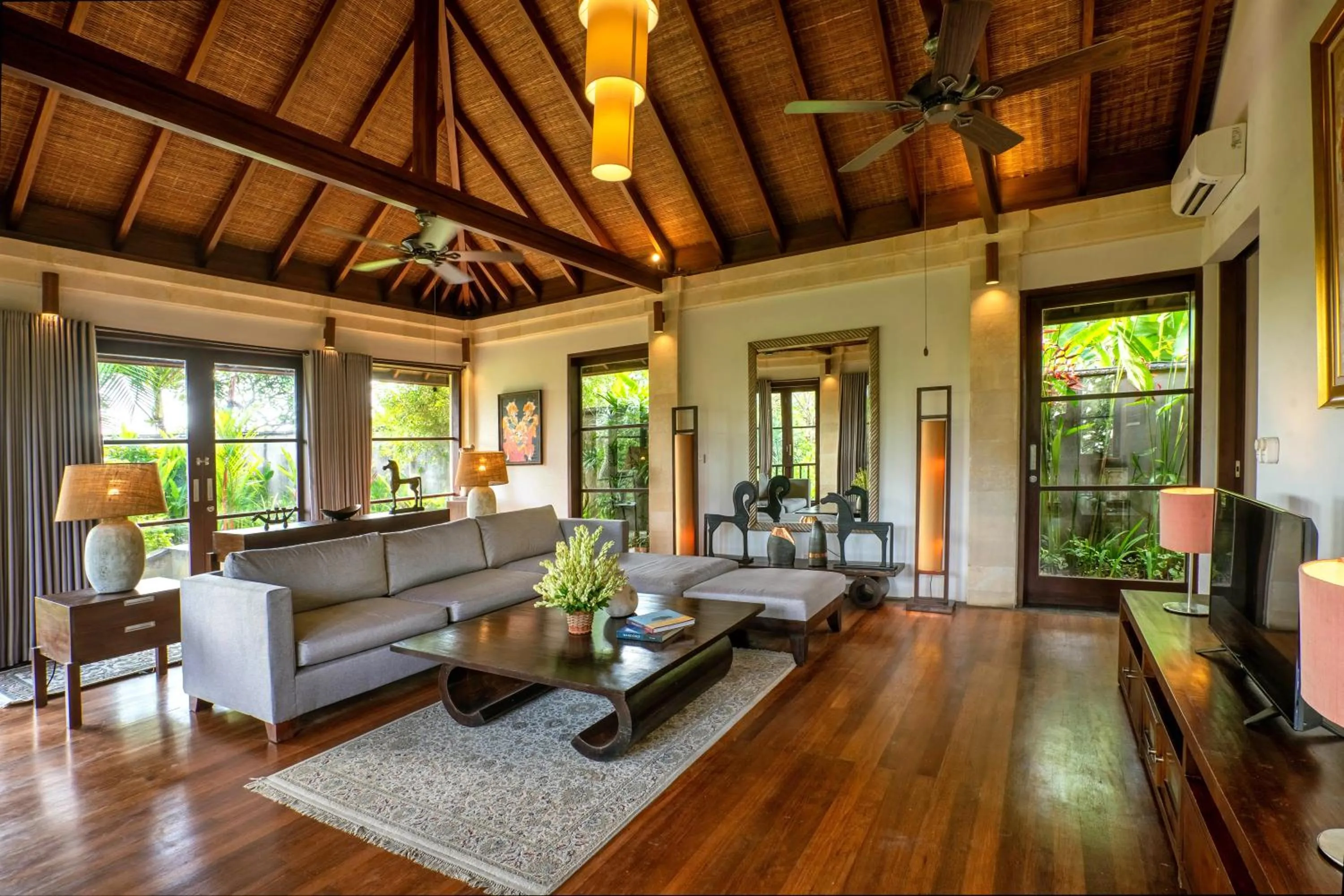 Communal lounge/ TV room in Villa Pulung Jimbaran by Nakula