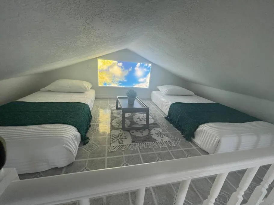 Bed in The Tiny Cottage in the Springs/ Central FL