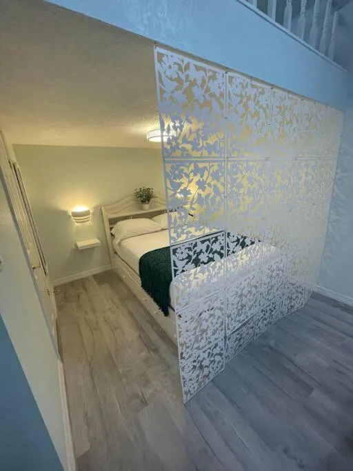 Bed in The Tiny Cottage in the Springs/ Central FL