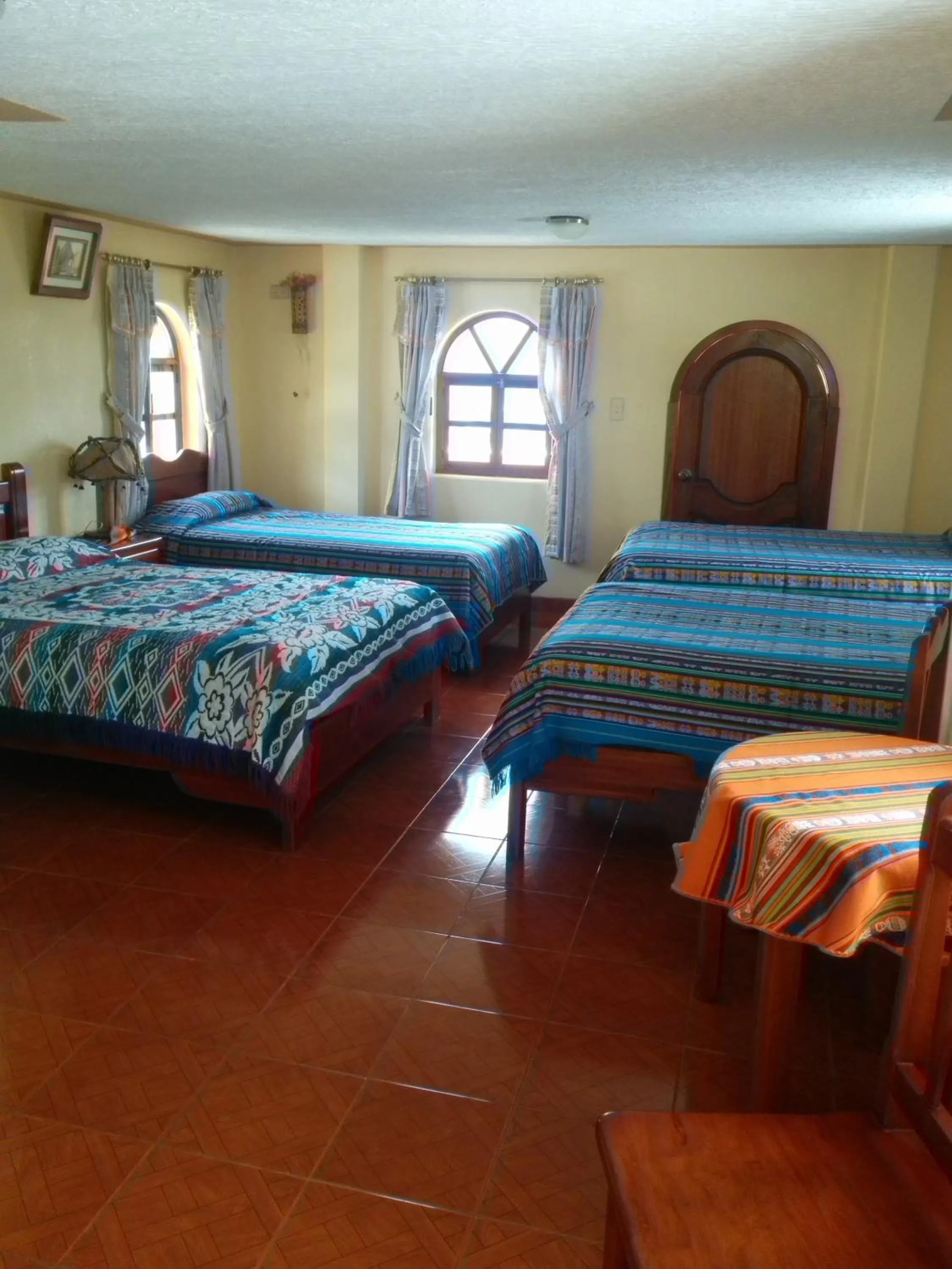 Photo of the whole room, Bed in Hostal Curiñan