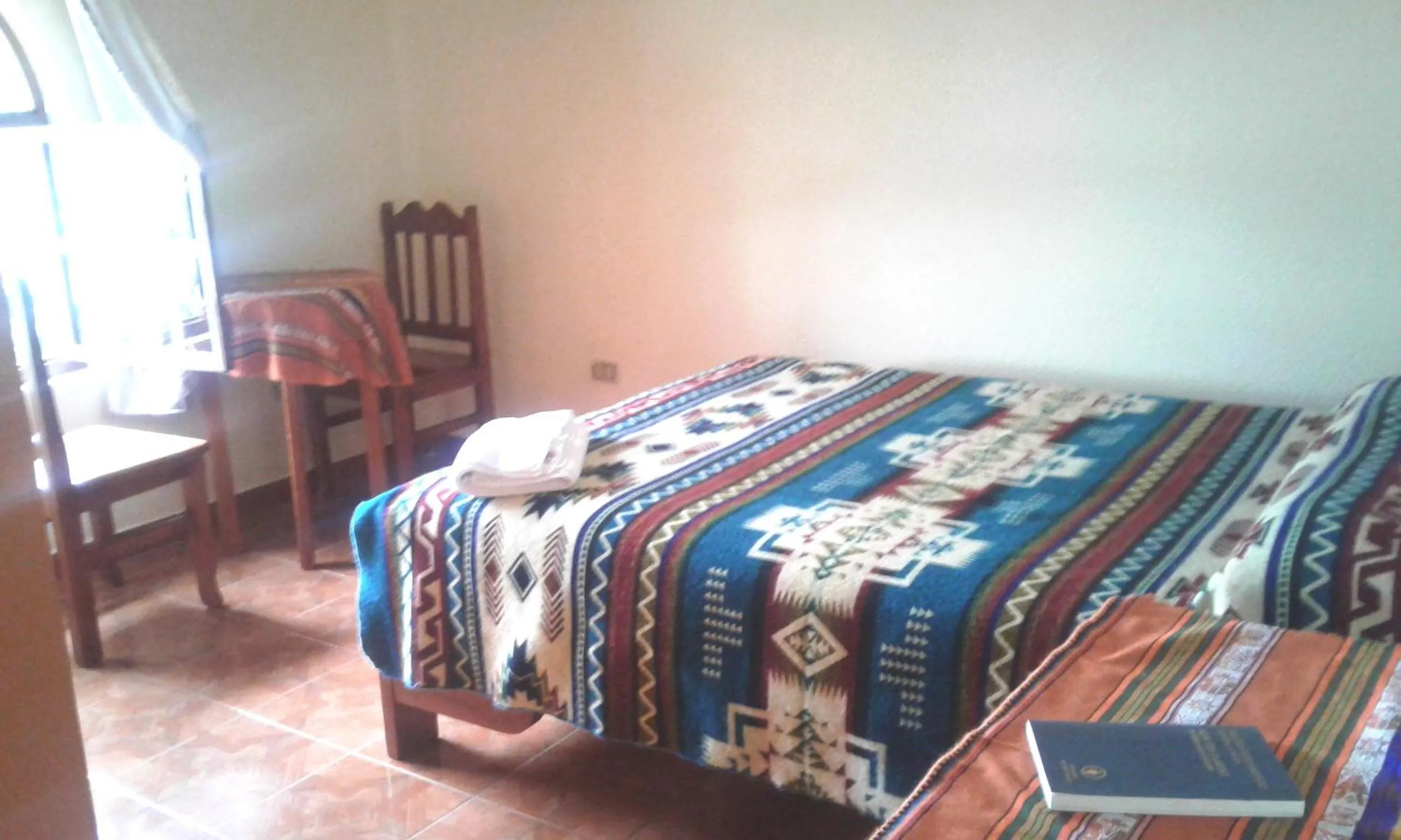 Photo of the whole room, Bed in Hostal Curiñan