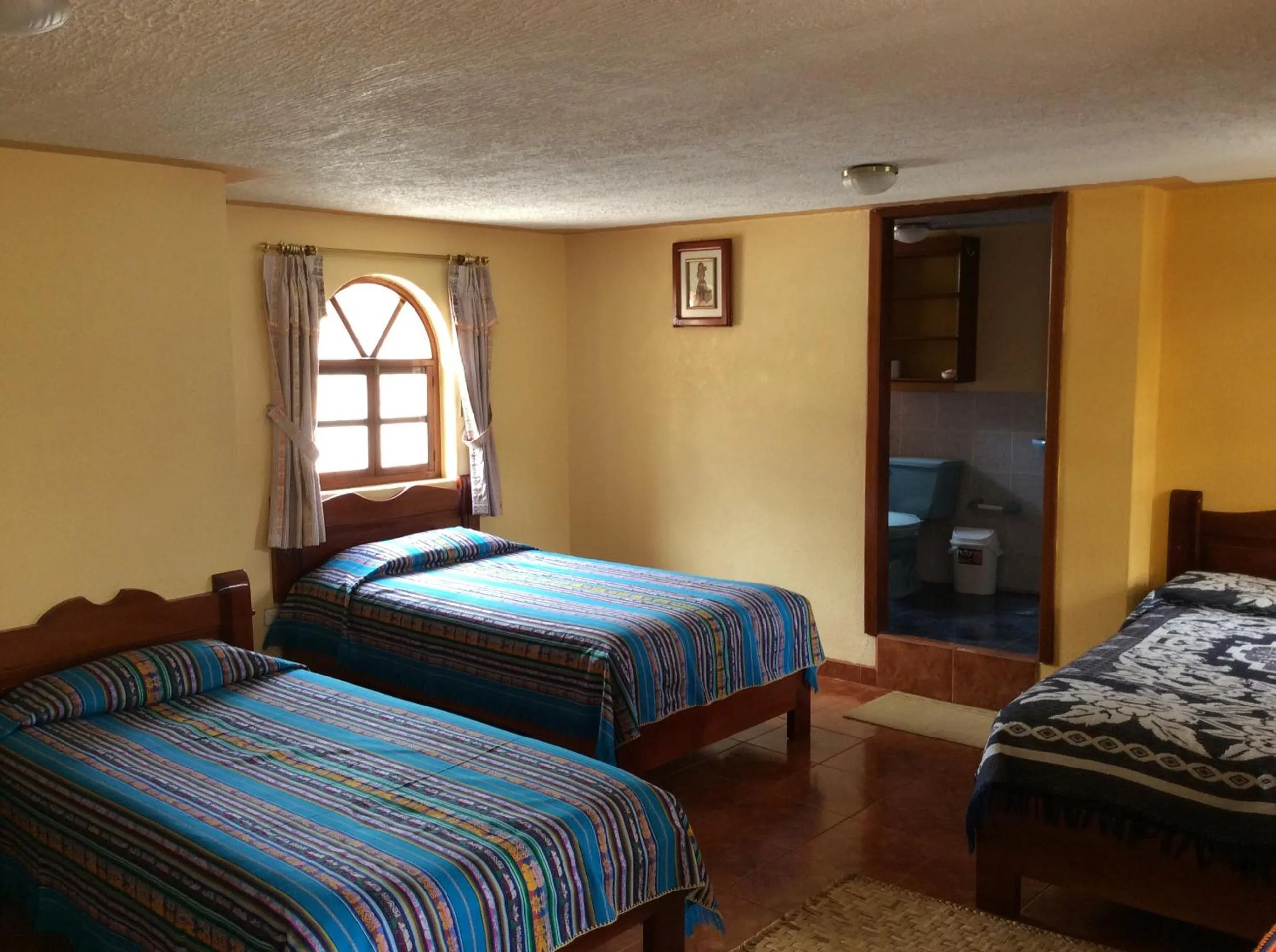 Photo of the whole room, Bed in Hostal Curiñan
