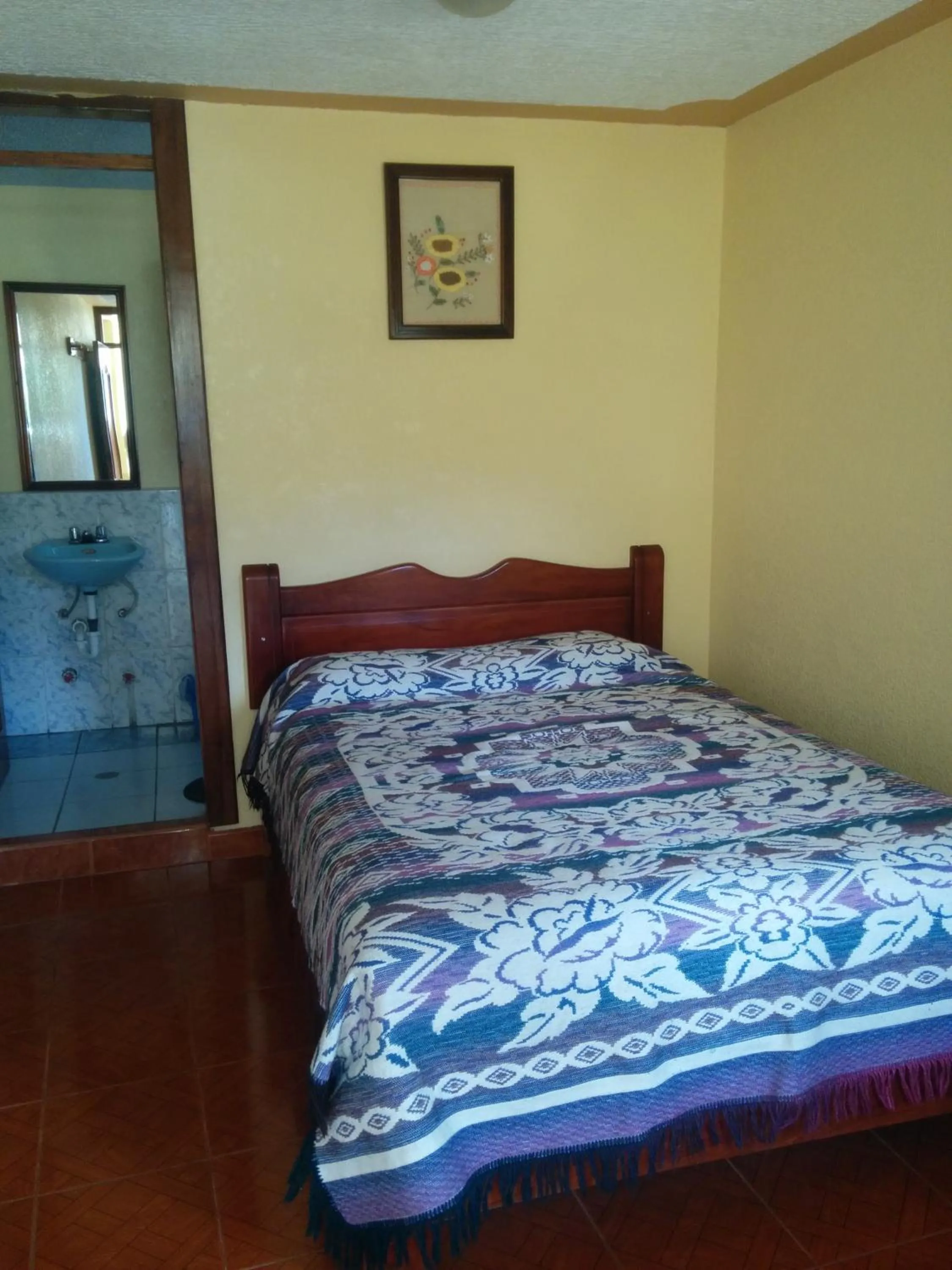 Photo of the whole room, Bed in Hostal Curiñan