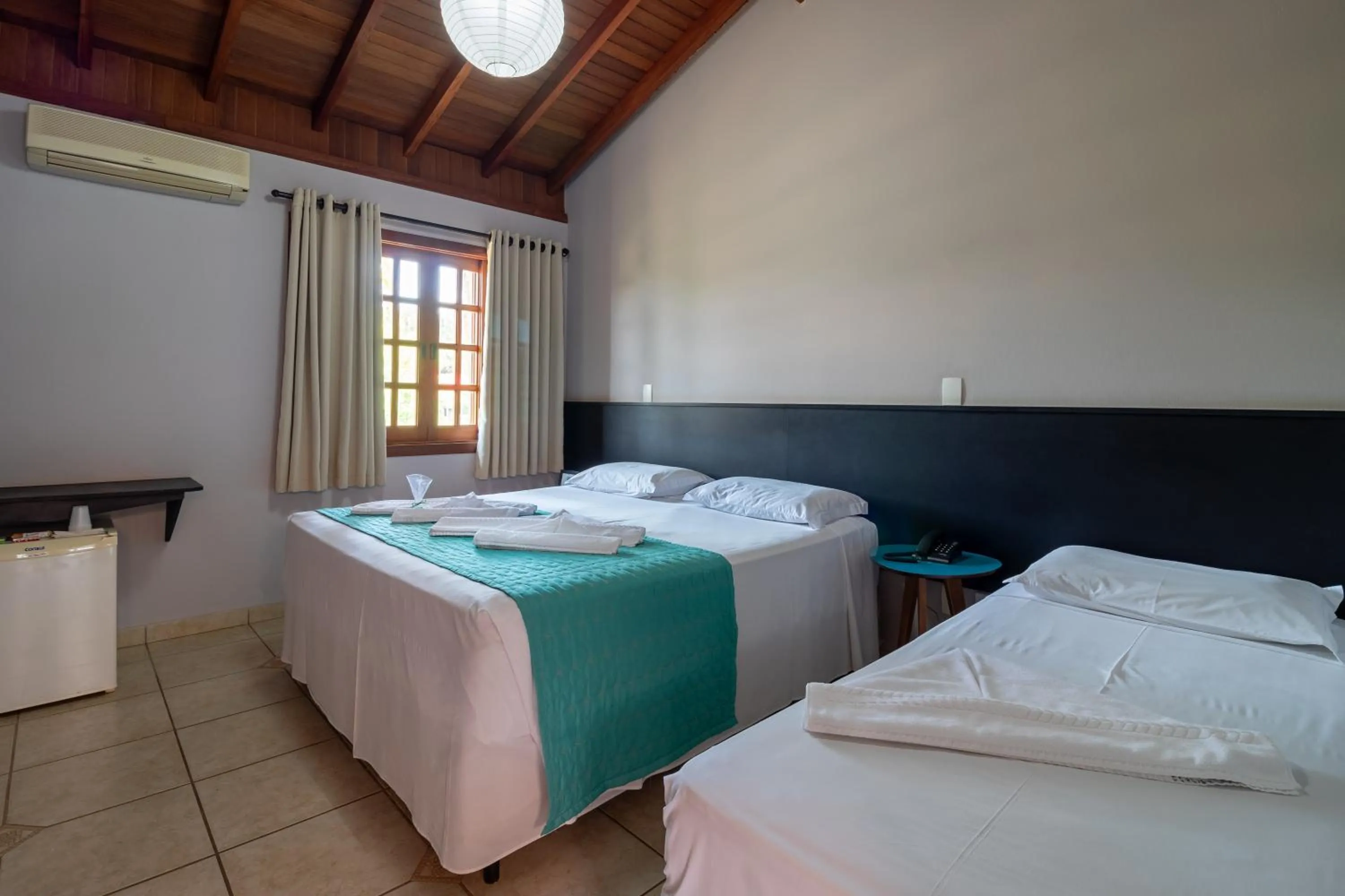 Bed in Pousada Pé na Terra