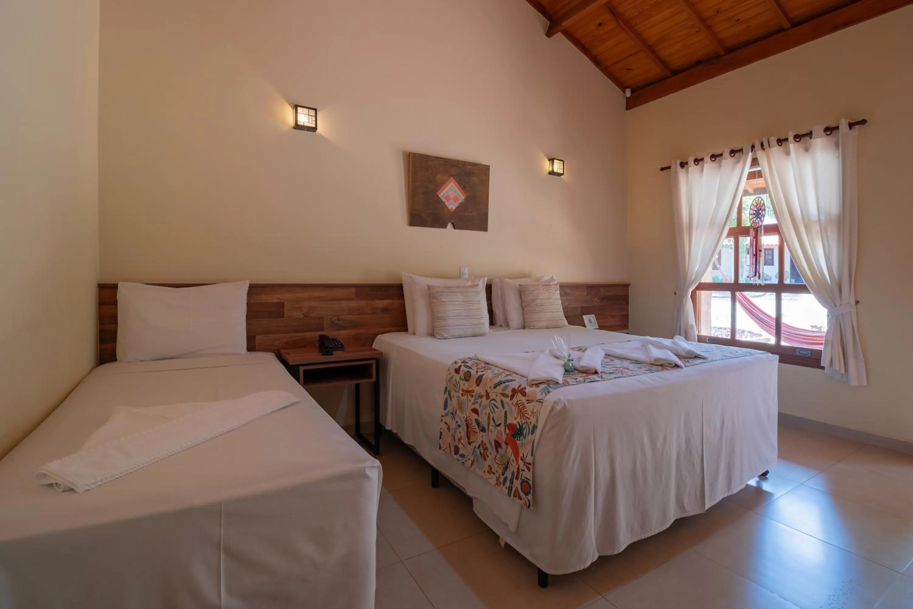 Bed in Pousada Pé na Terra