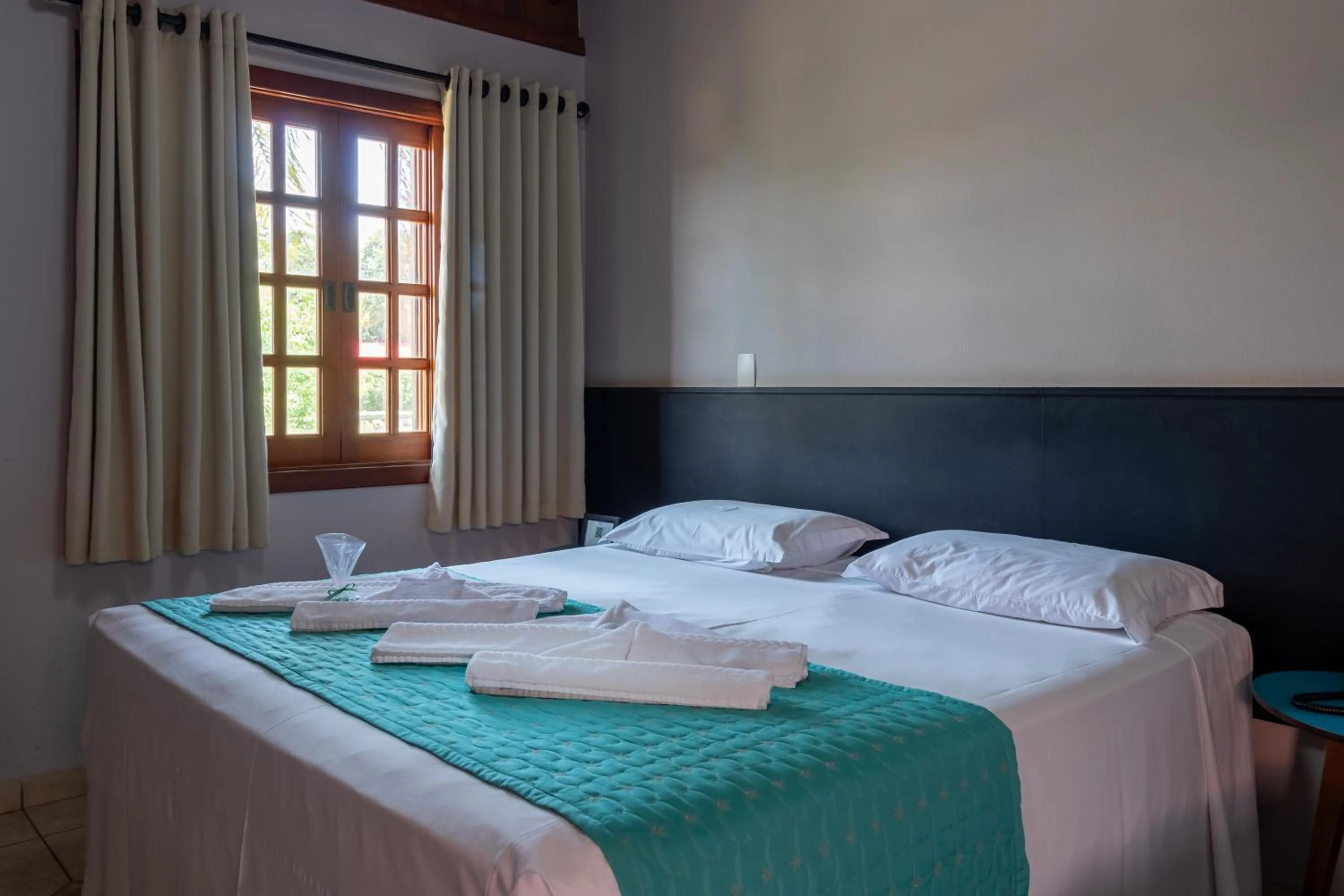 Bed in Pousada Pé na Terra