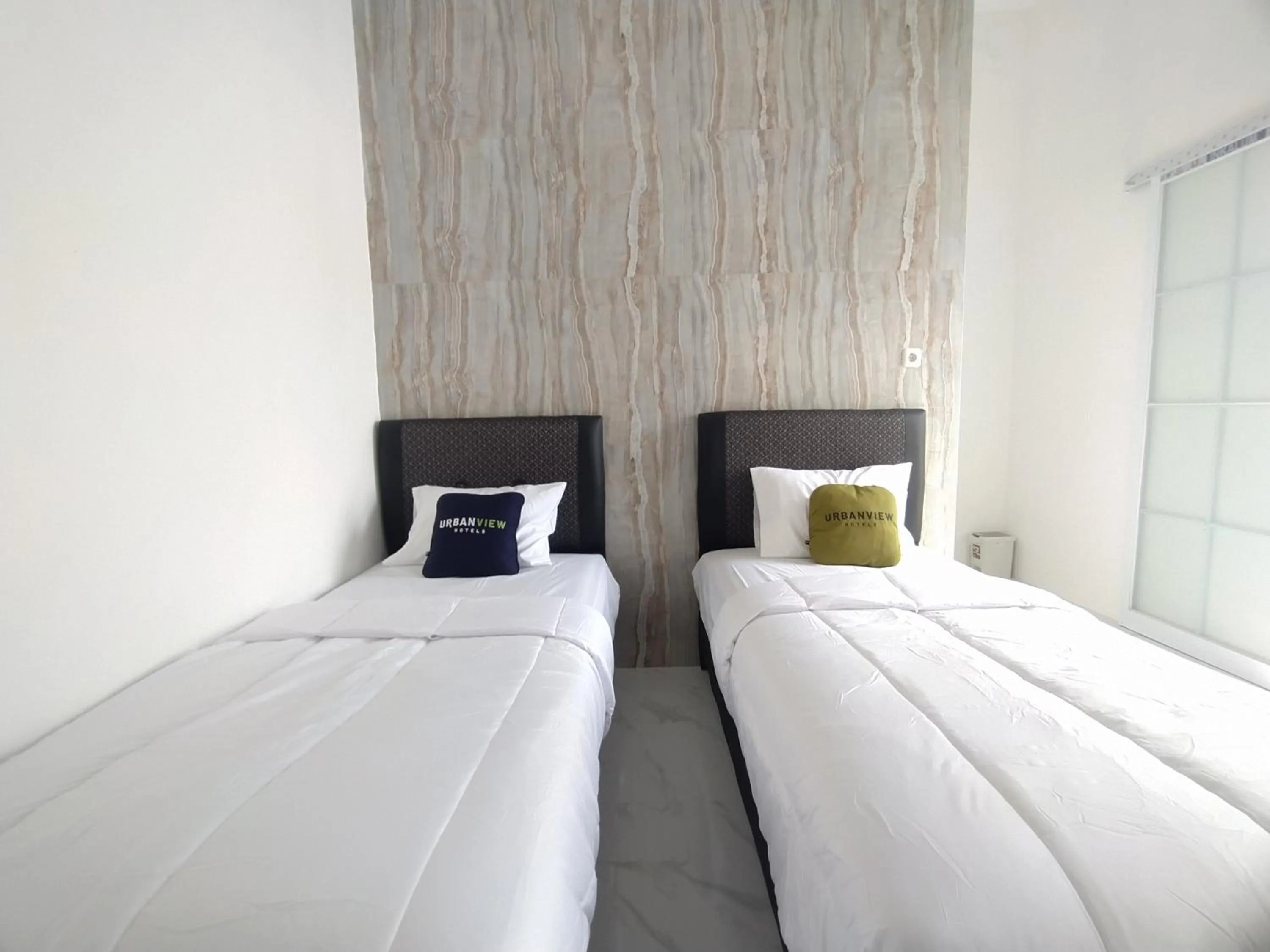 Bedroom, Bed in Urbanview Hotel Nimara Ngawi by RedDoorz