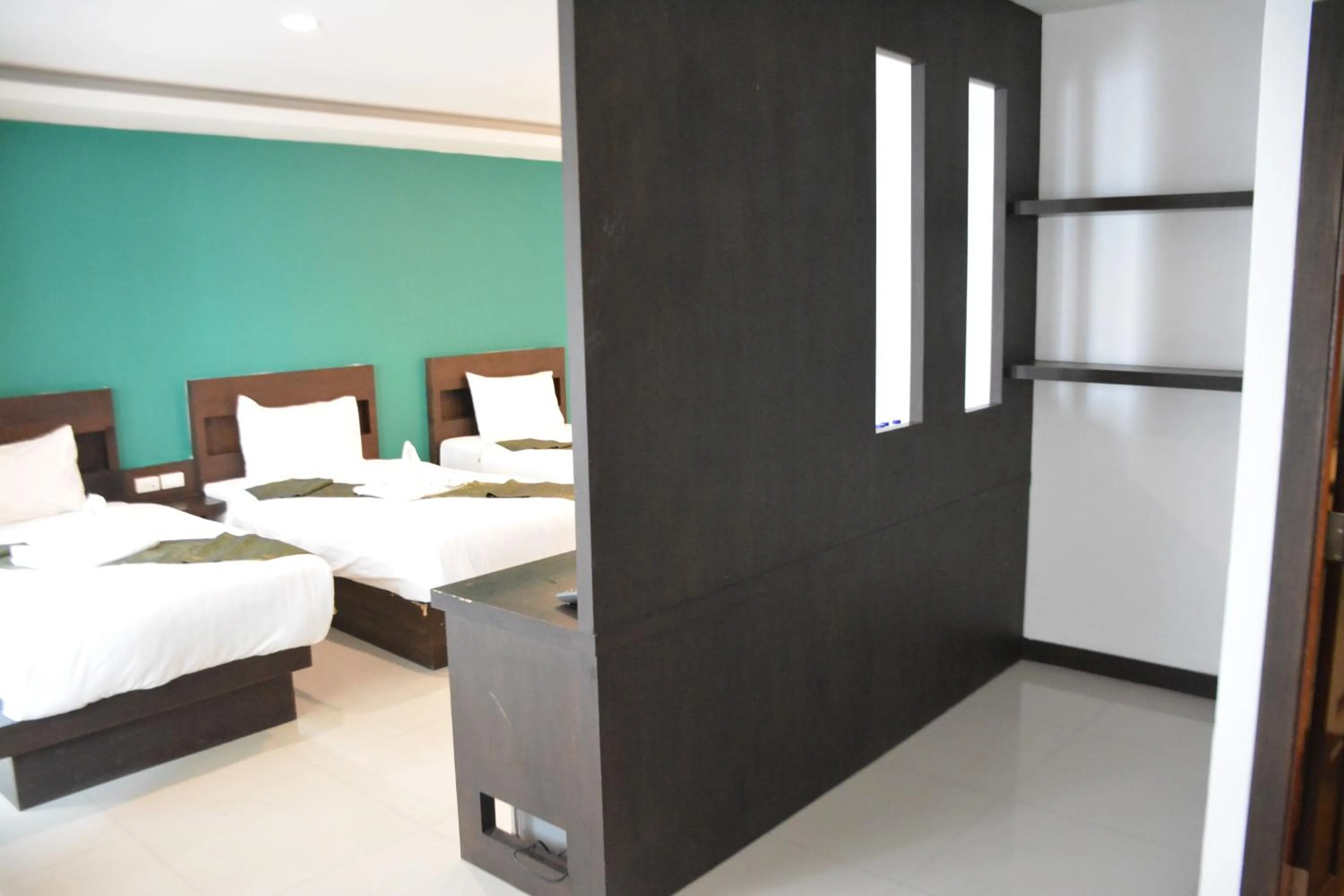 Bed in Zephyr Grand Hotel