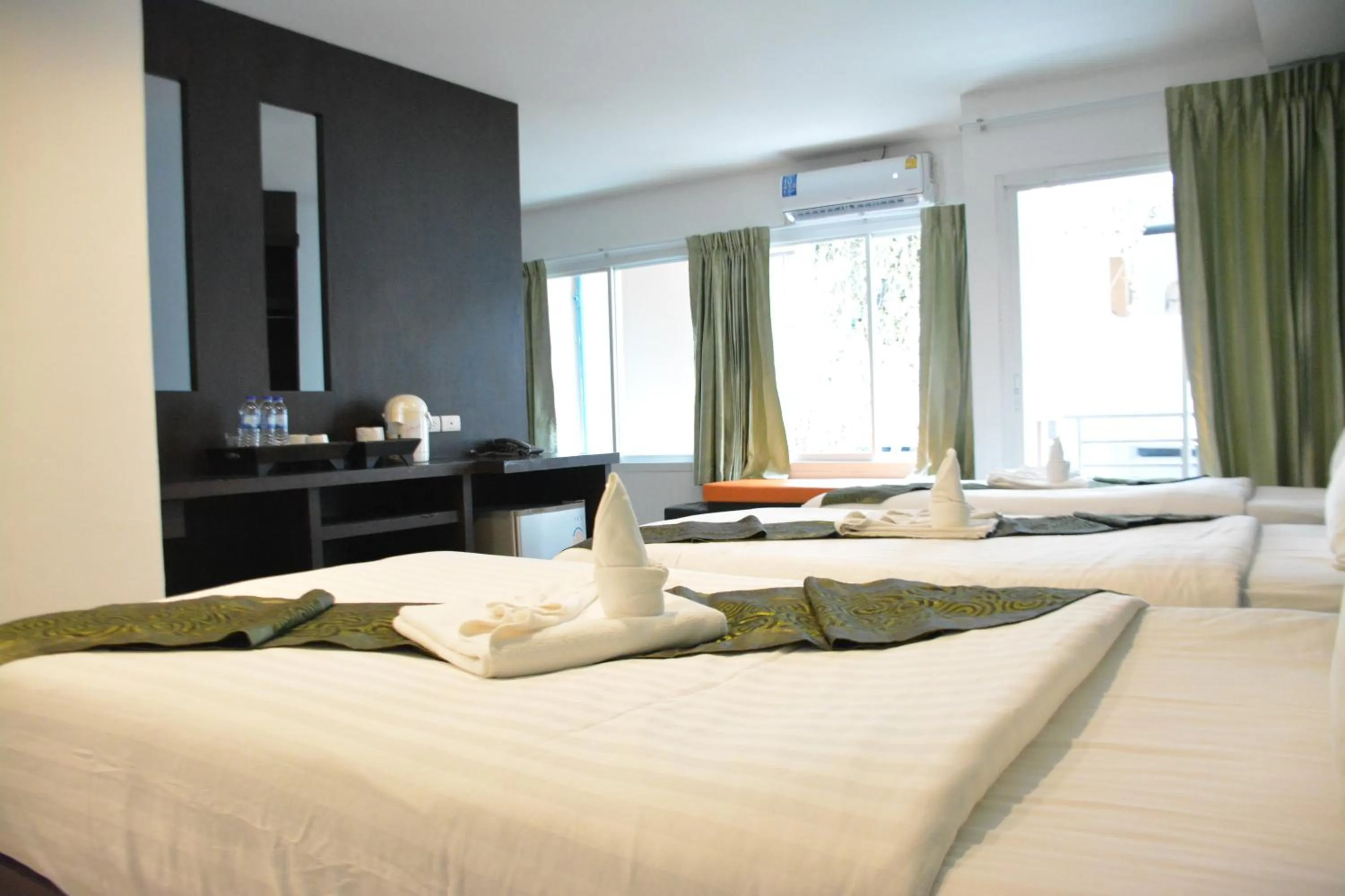 Bed in Zephyr Grand Hotel