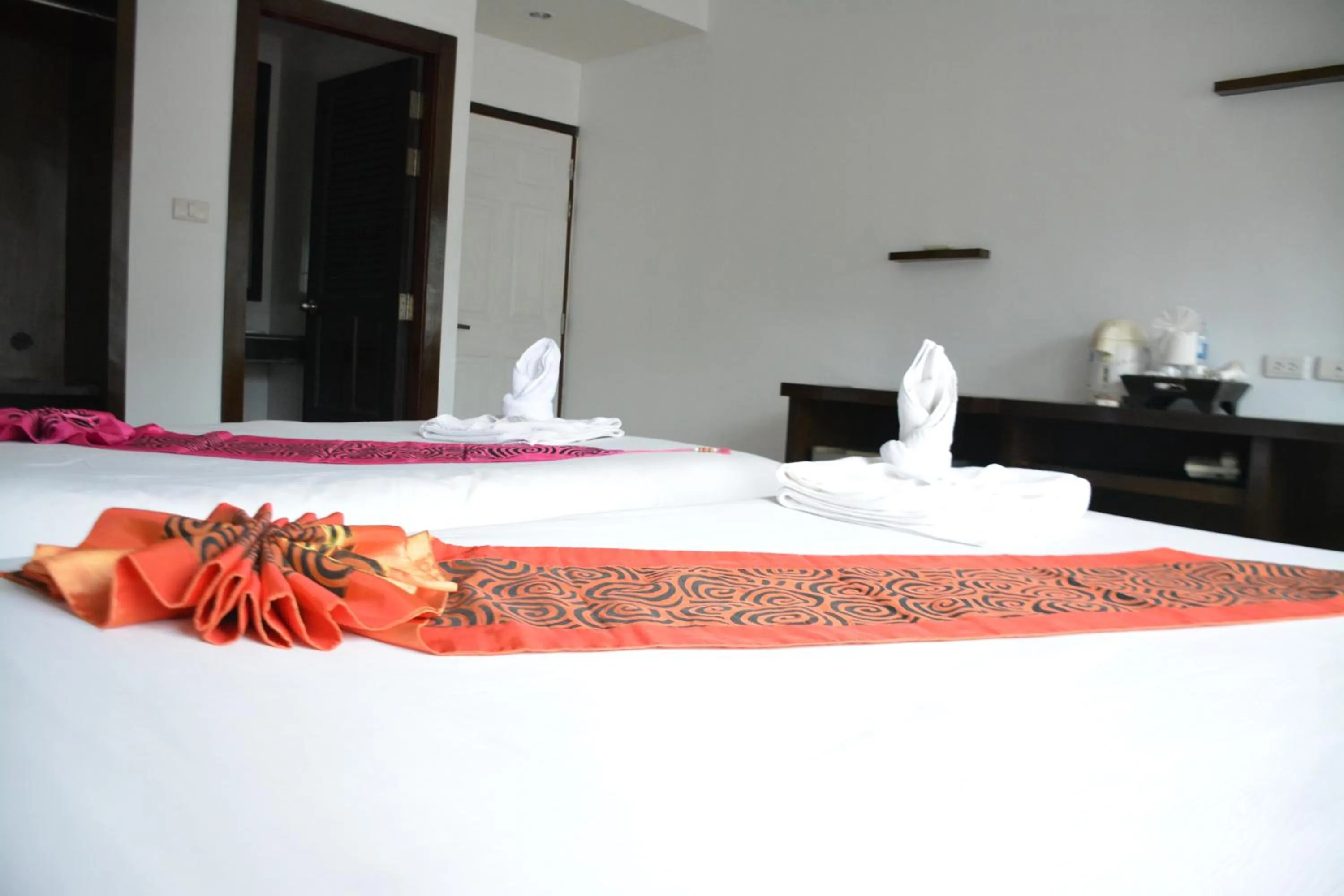 Bed in Zephyr Grand Hotel