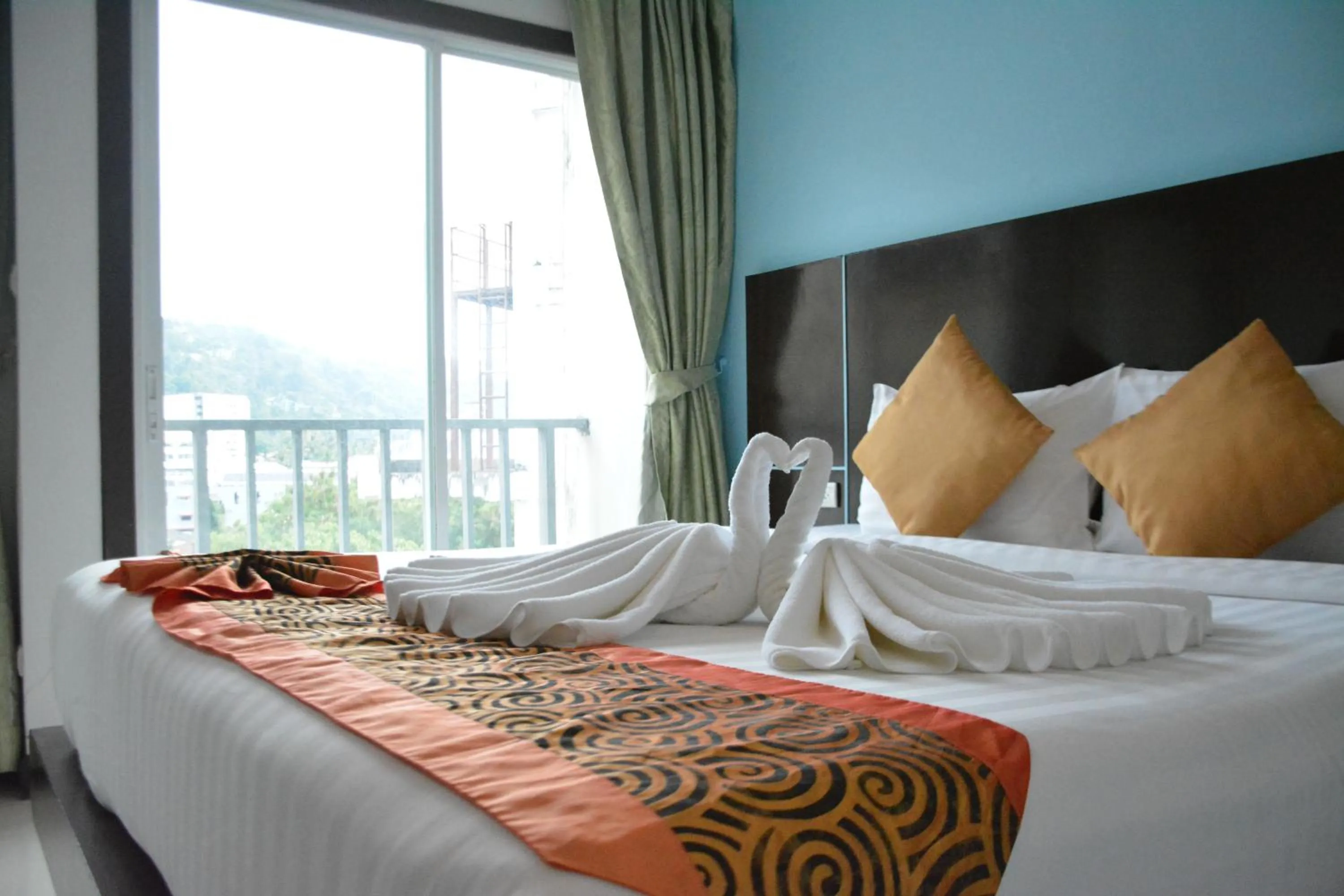 Bed in Zephyr Grand Hotel