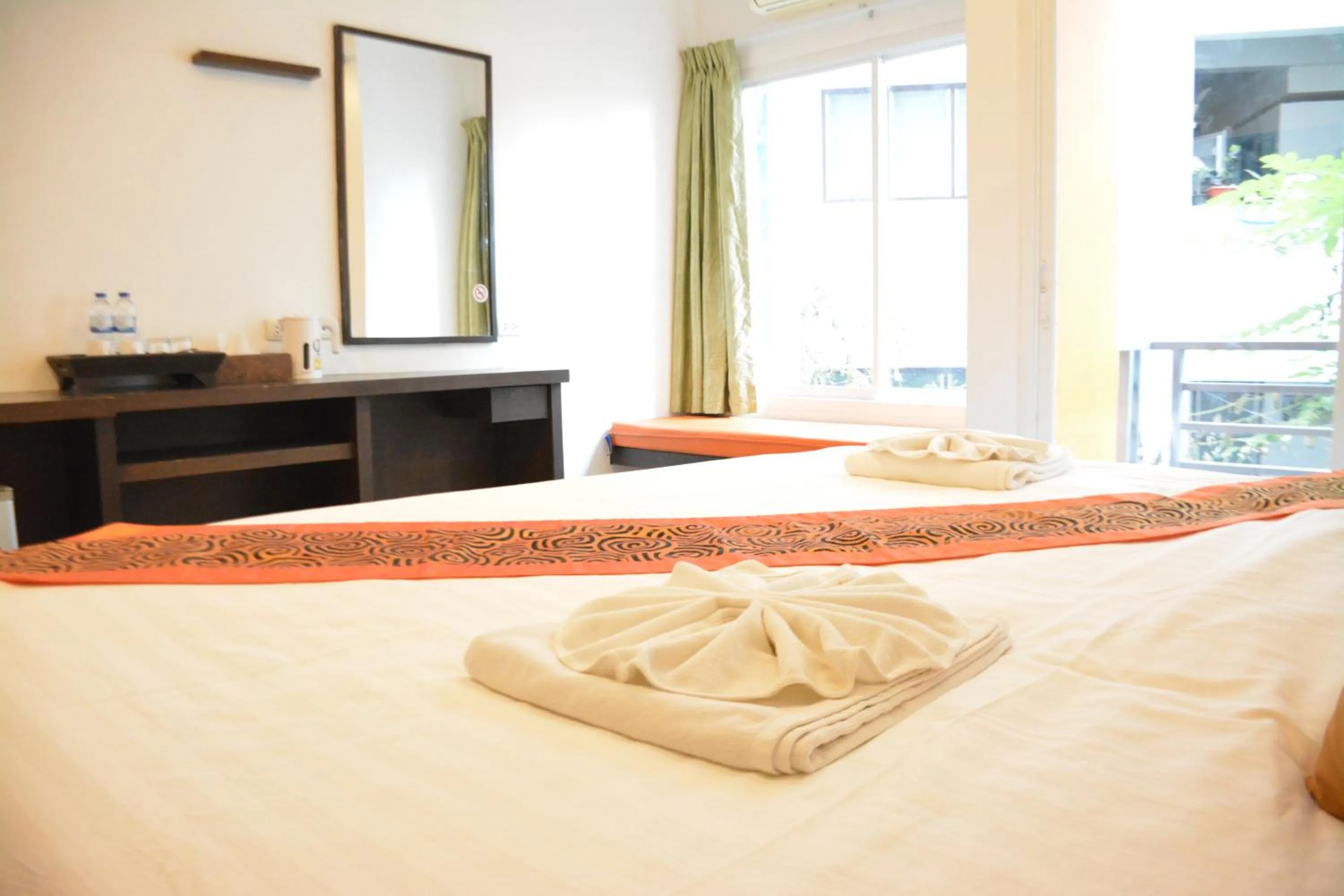 Bed in Zephyr Grand Hotel