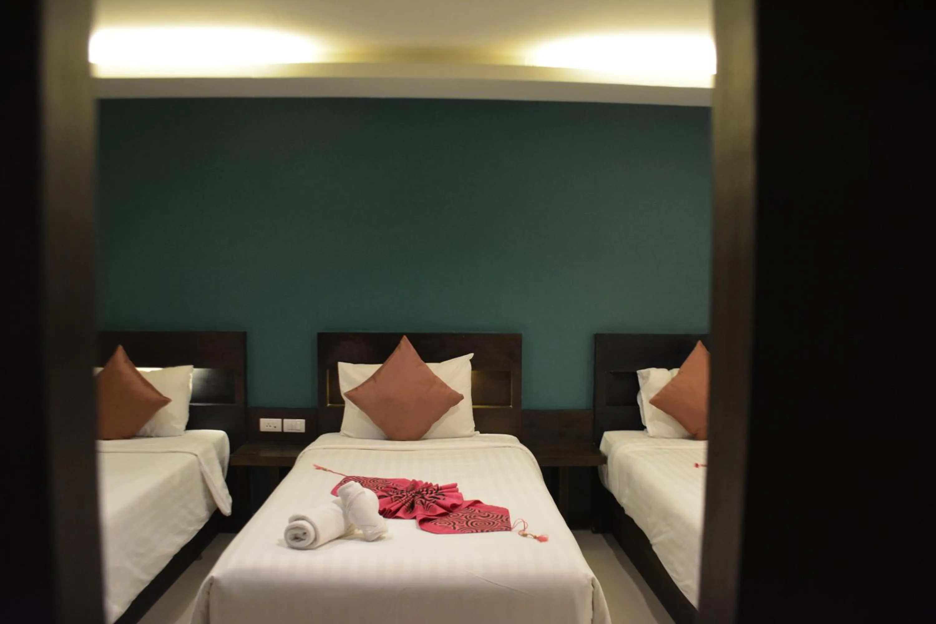 Bed in Zephyr Grand Hotel