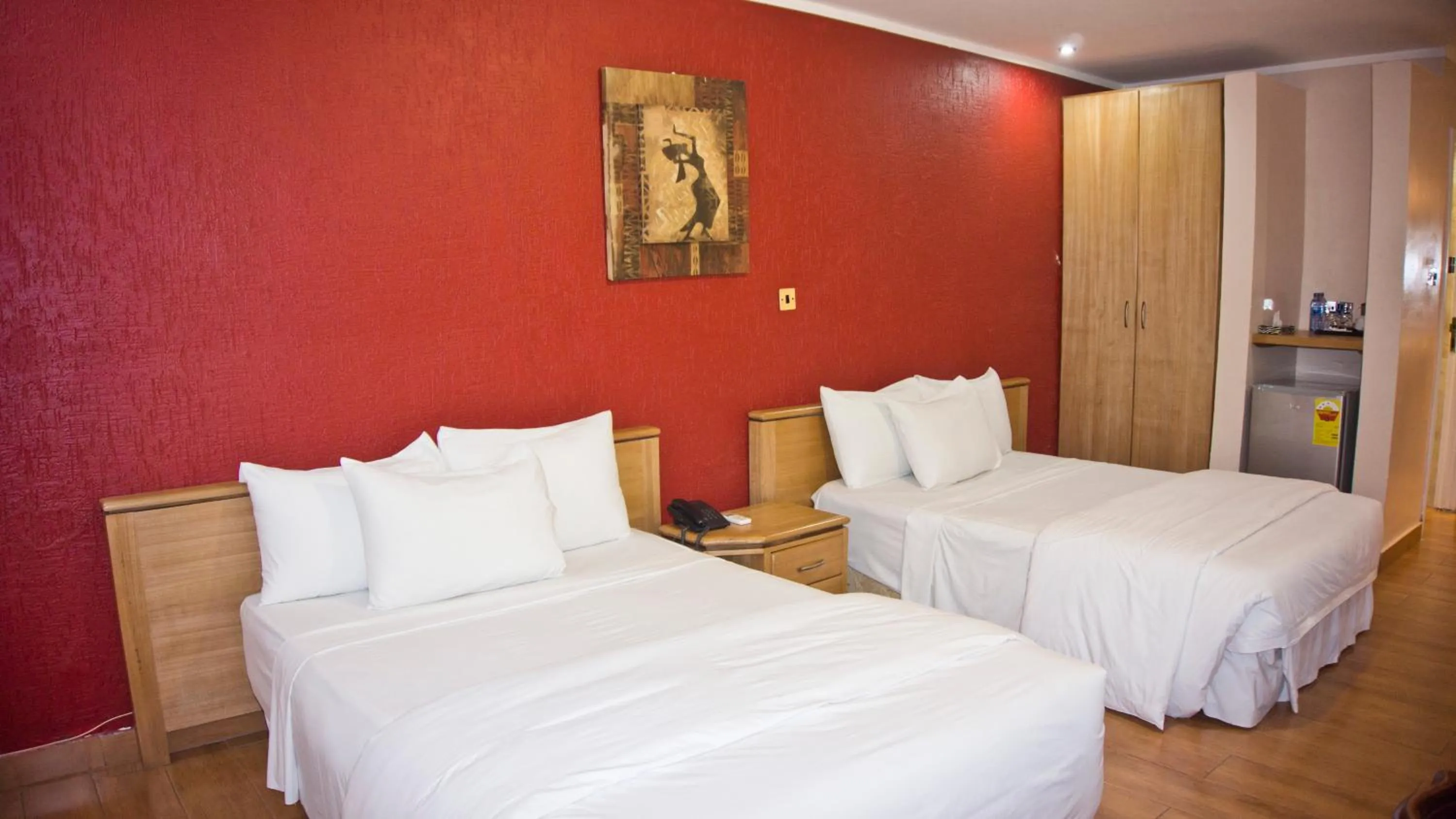 Bedroom, Bed in Tropical Enclave Hotel