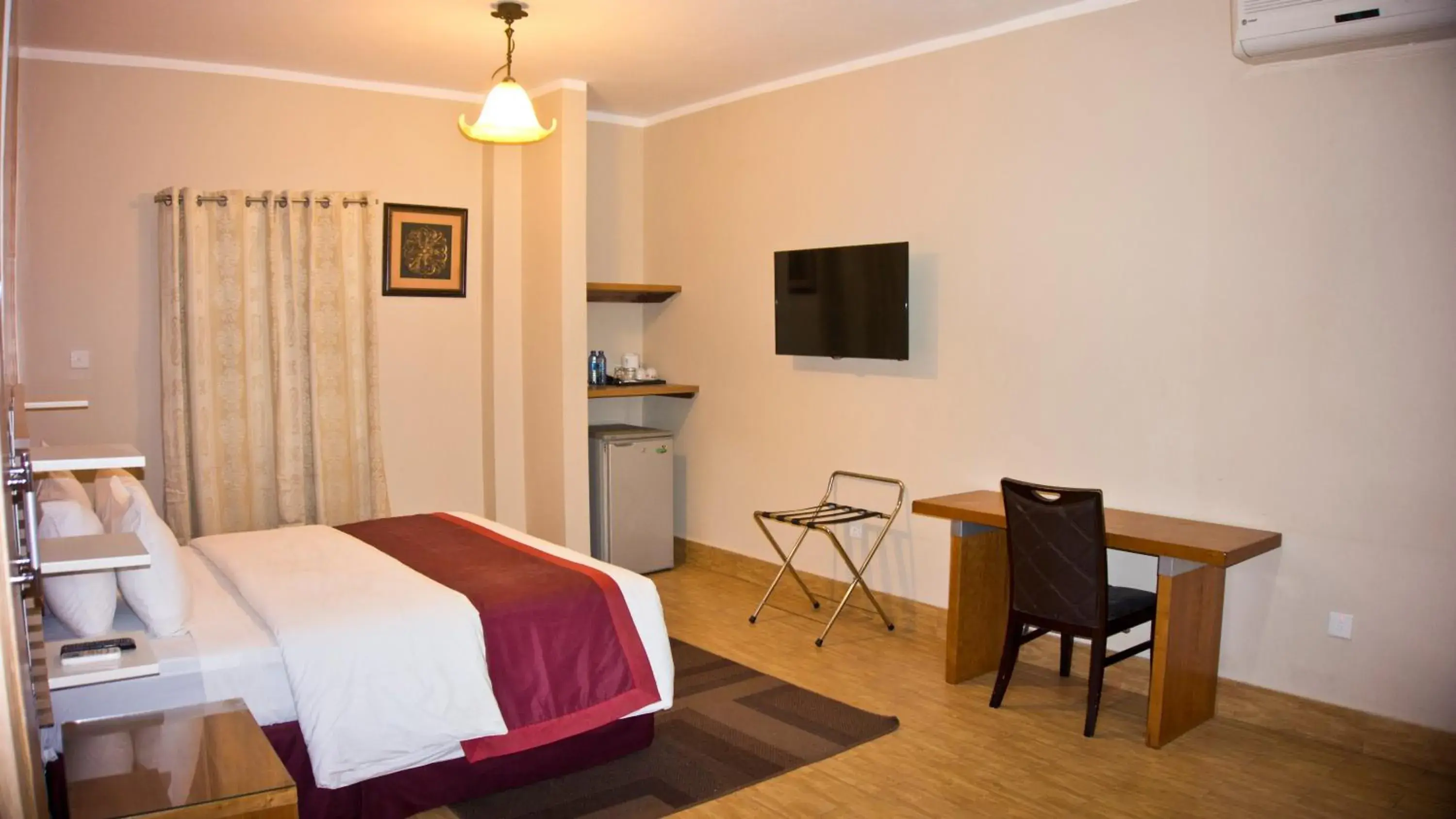 Photo of the whole room in Tropical Enclave Hotel Photo of the whole room in Tropical Enclave Hotel